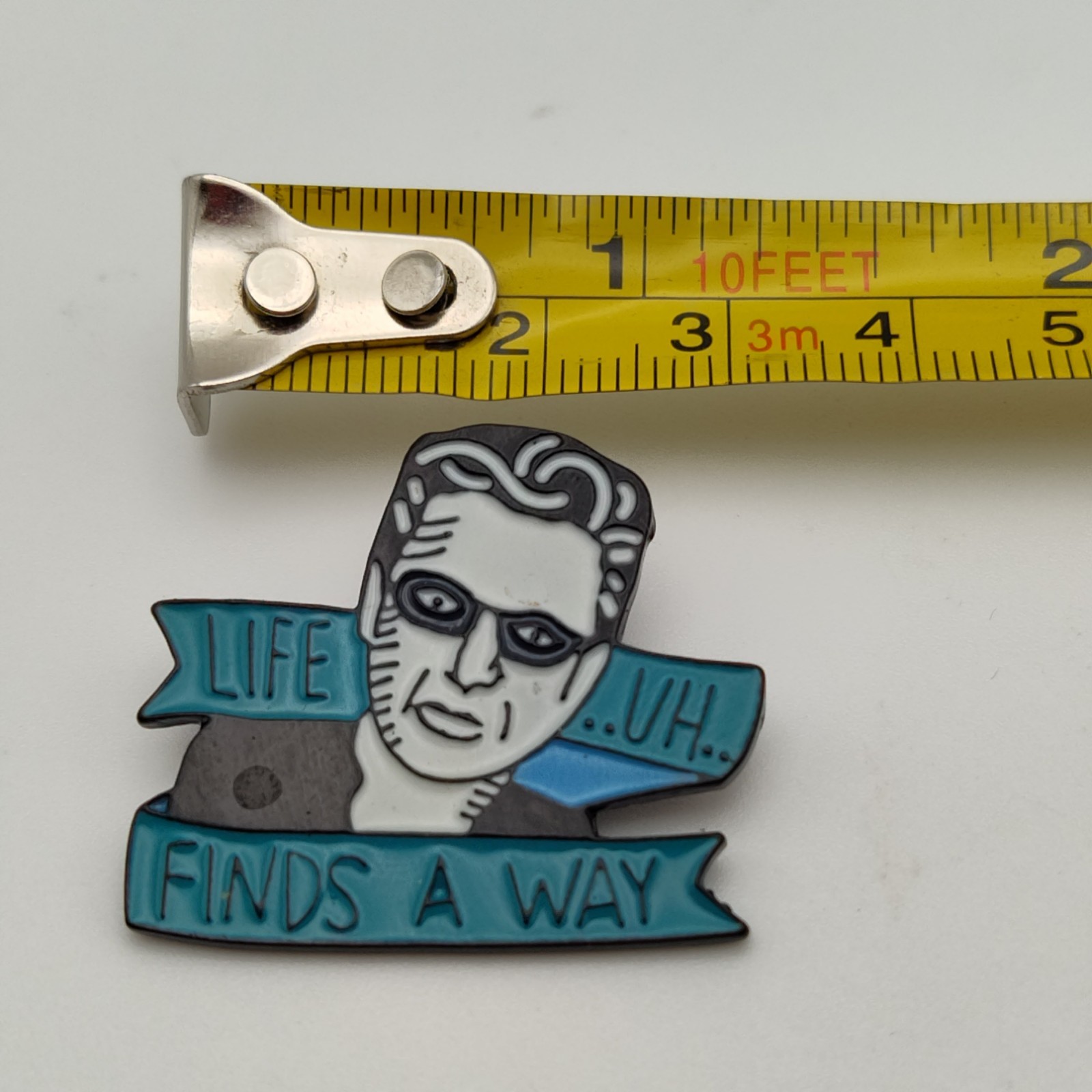 Vintage Jurassic Park Enamel Lapel Pin Jeff Goldblum “Life Uh Finds A Way”