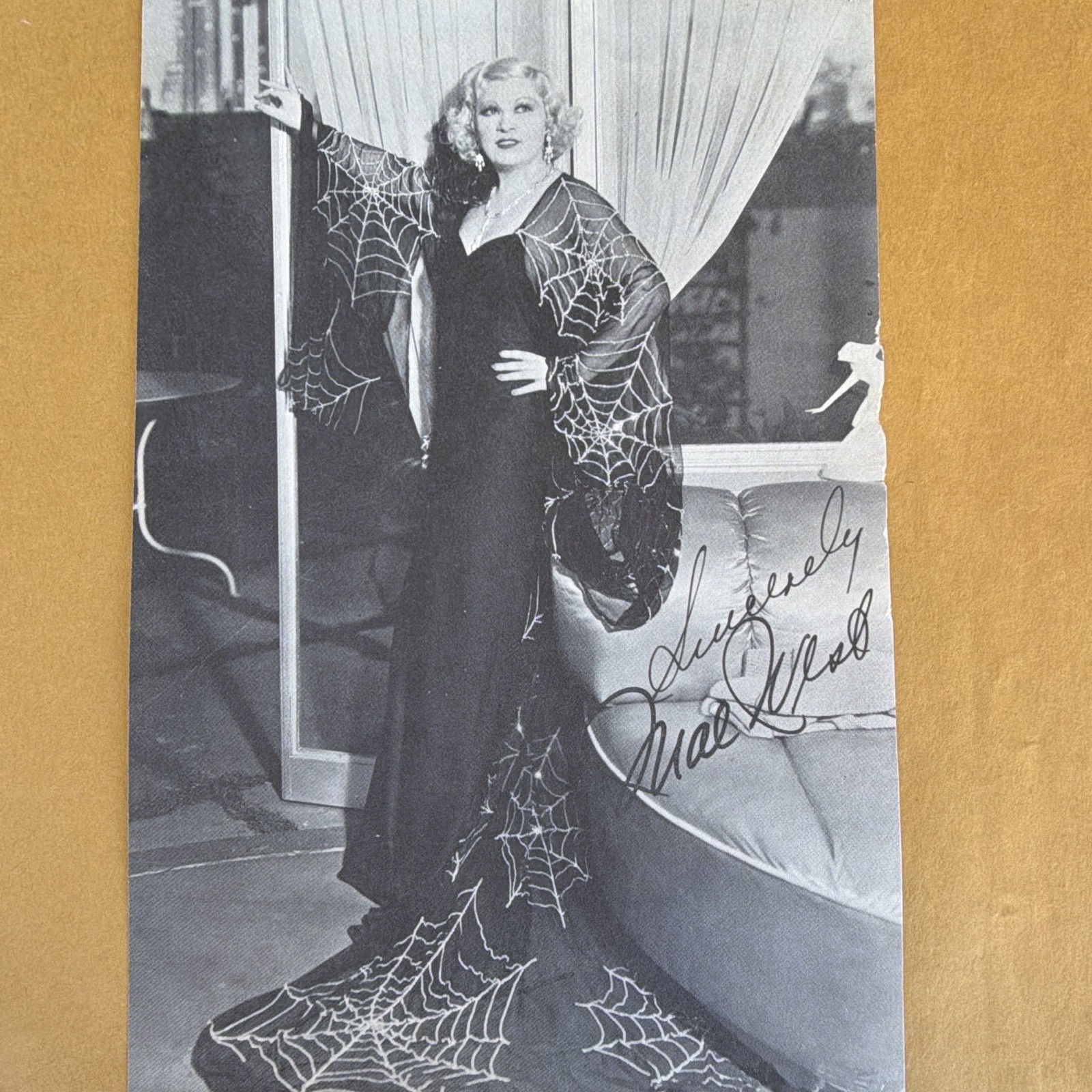 Rare Mae West in Spider Web Dress – 5×8. Has her quotes on backside