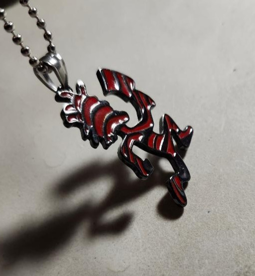 New- Hatchetman gun metal tone pendant w/Red Zebra stripes/30 inch ball chain