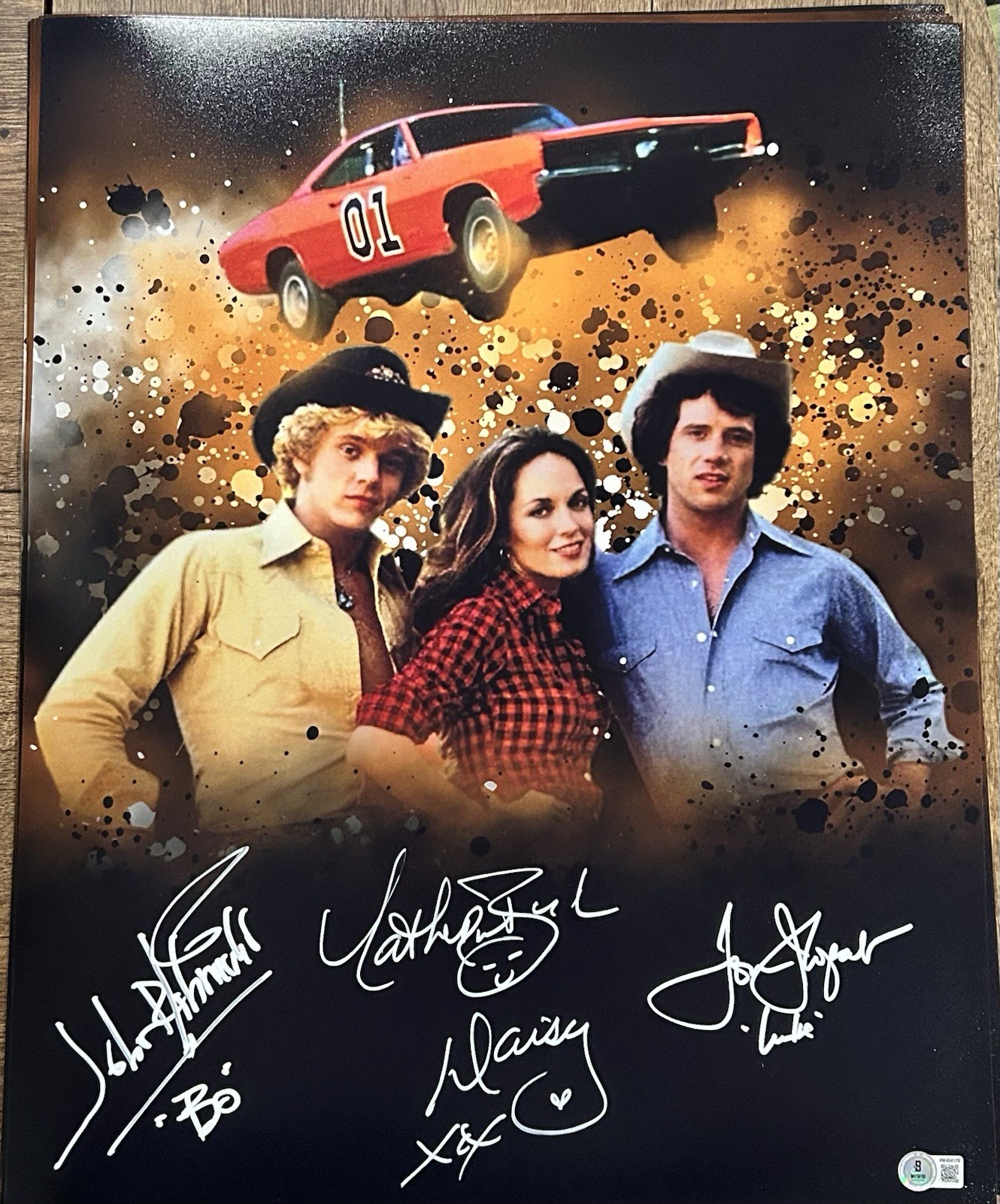 DUKES OF HAZARD 16×20 SIGNED BY BO LUKE AND DAISY BECKETT COA