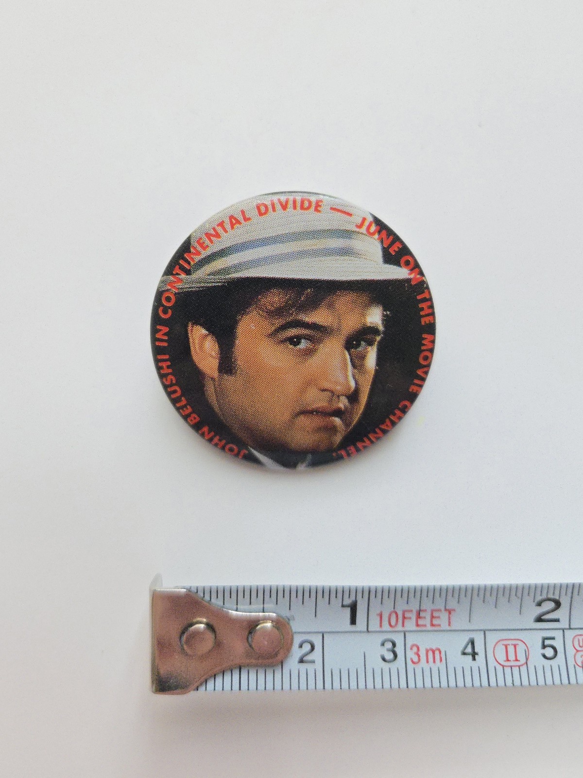 VINTAGE 1982 THE MOVIE CHANNEL PROMO BUTTON #3 JOHN BELUSHI CONTINENTAL DIVIDE