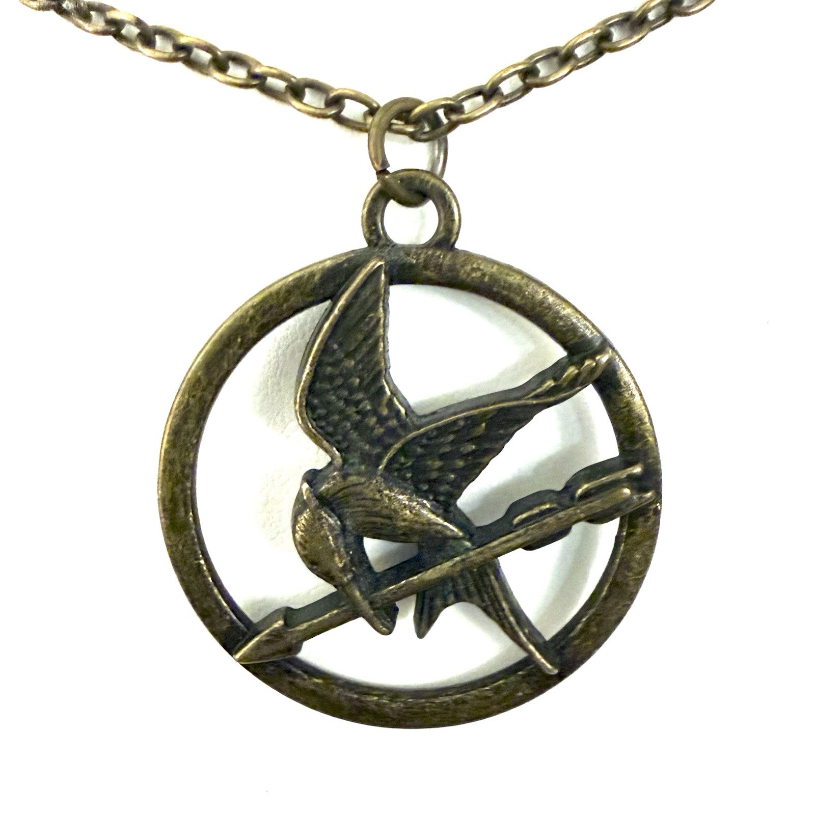 Hunger Games Mockingjay Necklace • Lionsgate Bronze Bird Arrow Pendant