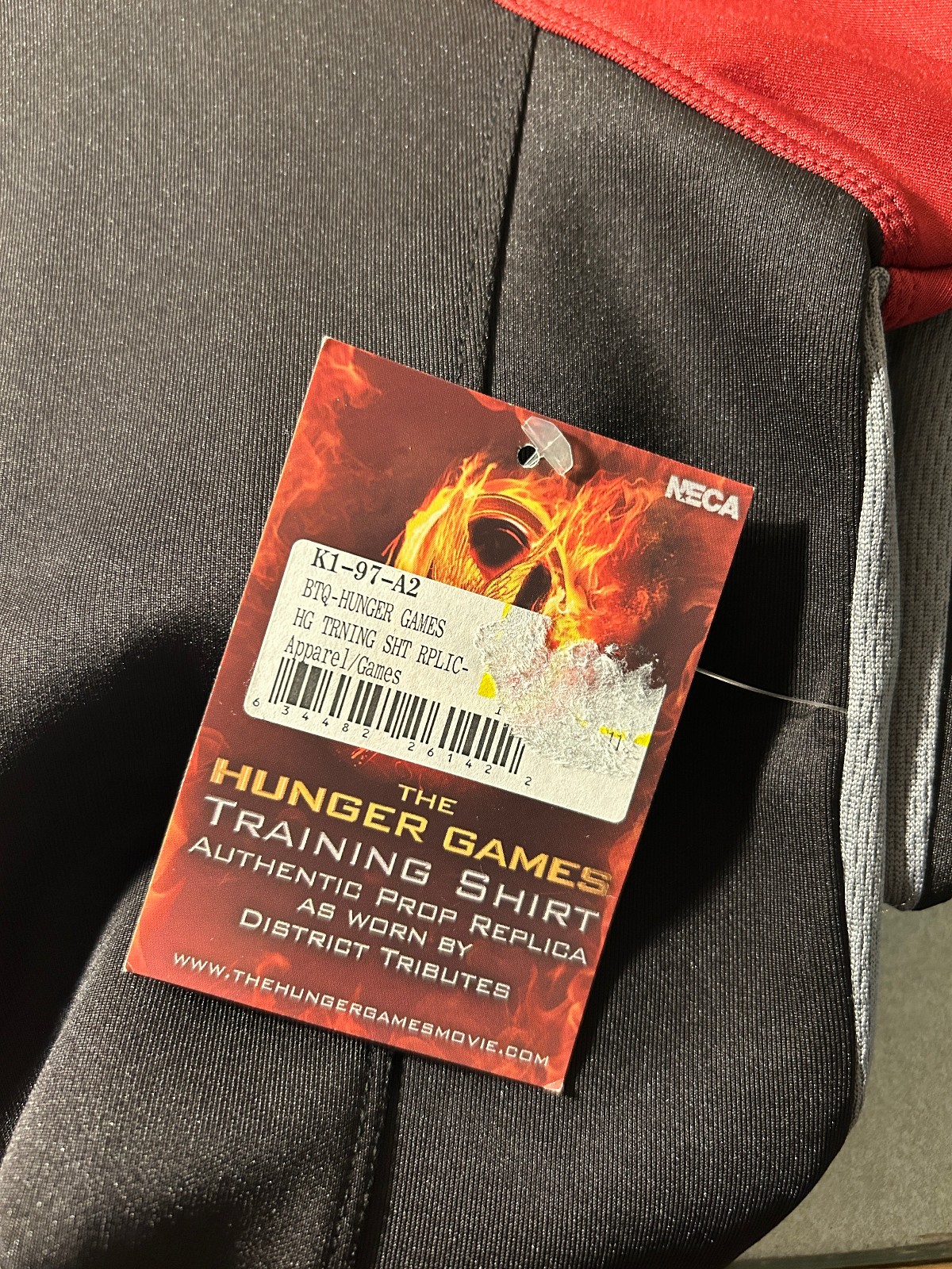 HUNGER GAMES TRAINING SHIRT Authentic Prop replica Katniss District 12 NWT SMALL