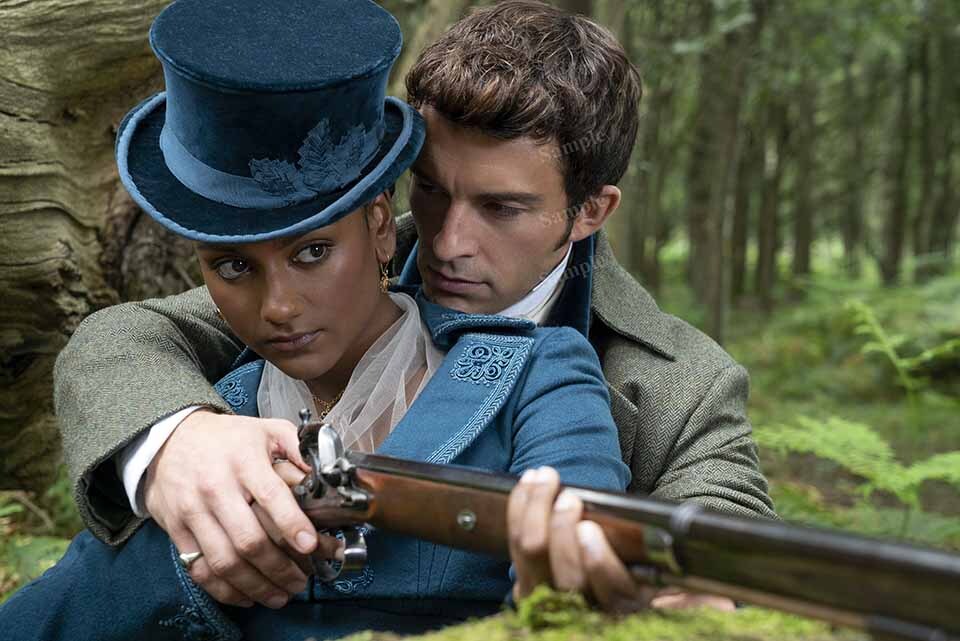 Jonathan Bailey showing Simone Ashley how to aim shoot Bridgerton Photo -CL3471