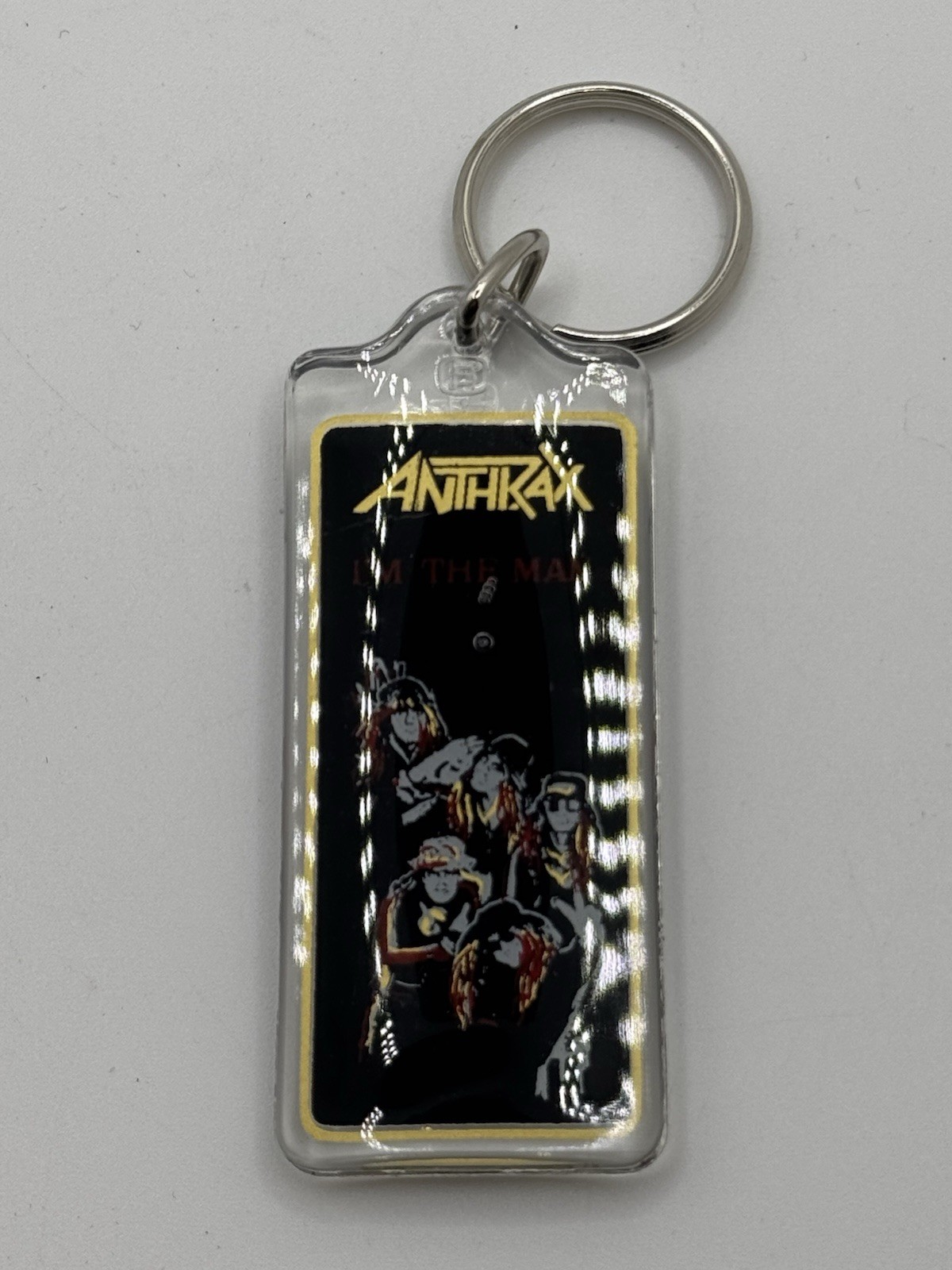 RARE! Vintage 80’s ANTHRAX “I’m The Man” Law Metal Rock Band PLASTIC keychain