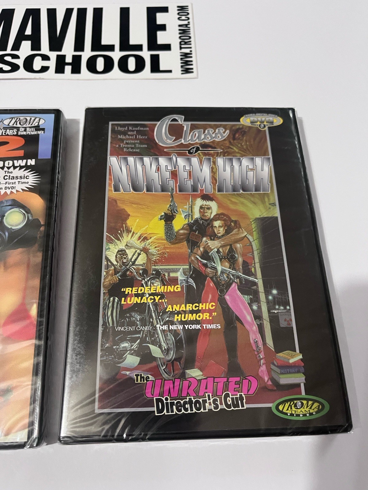 SIGNED Lloyd Kaufman Nuke ‘Em High Spill-Ogy Box Set + RARE Tromaville Sticker