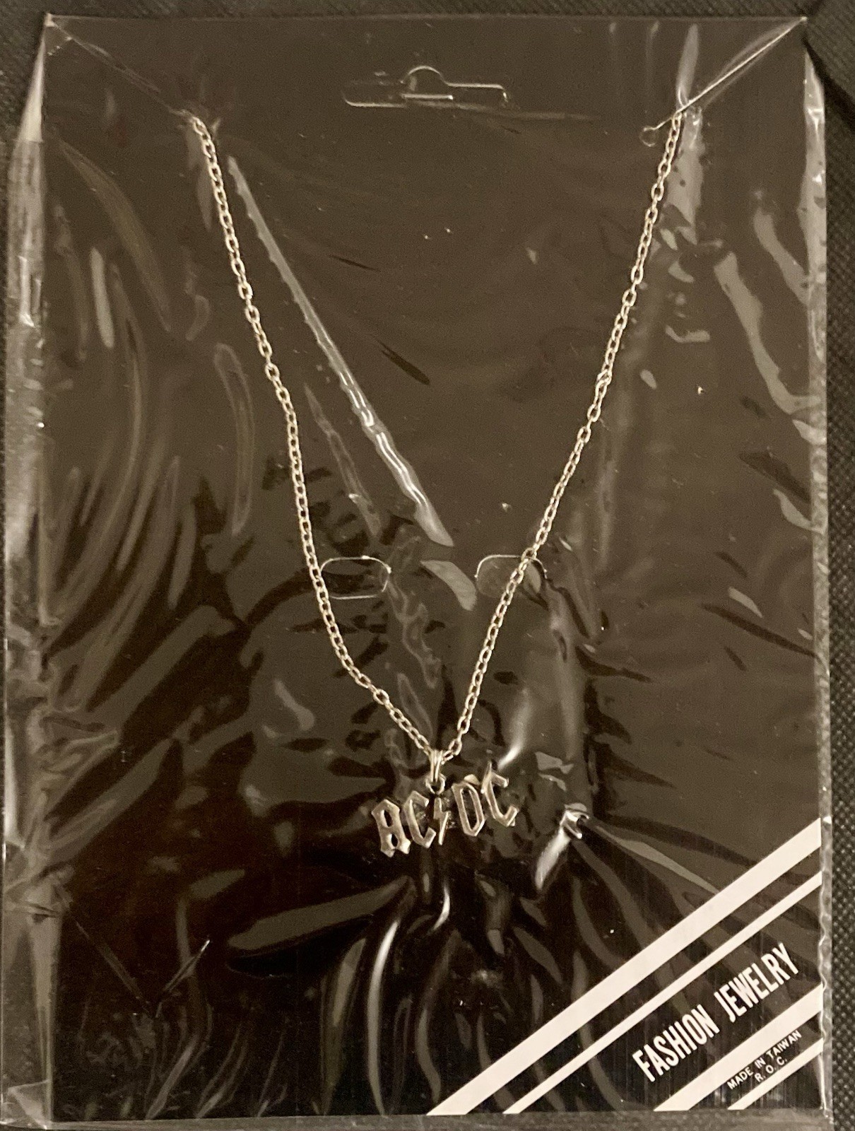 AC/DC 25″ Chain Link Necklace/Pendent with Logo 1980’s on Original Card