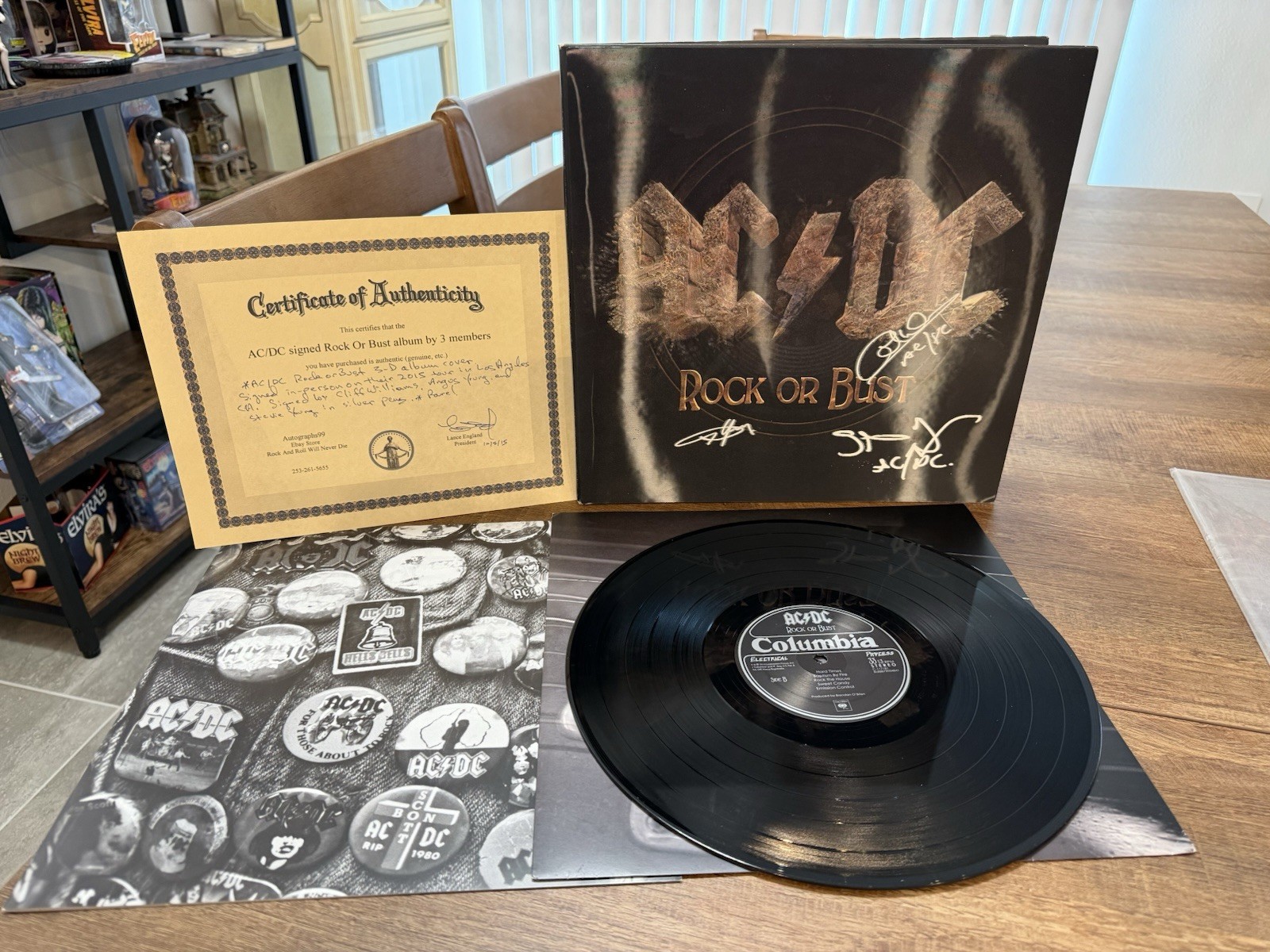 AC/DC Signed Rock or Bust Vinyl Angus Young Stevie Young Cliff Williams COA