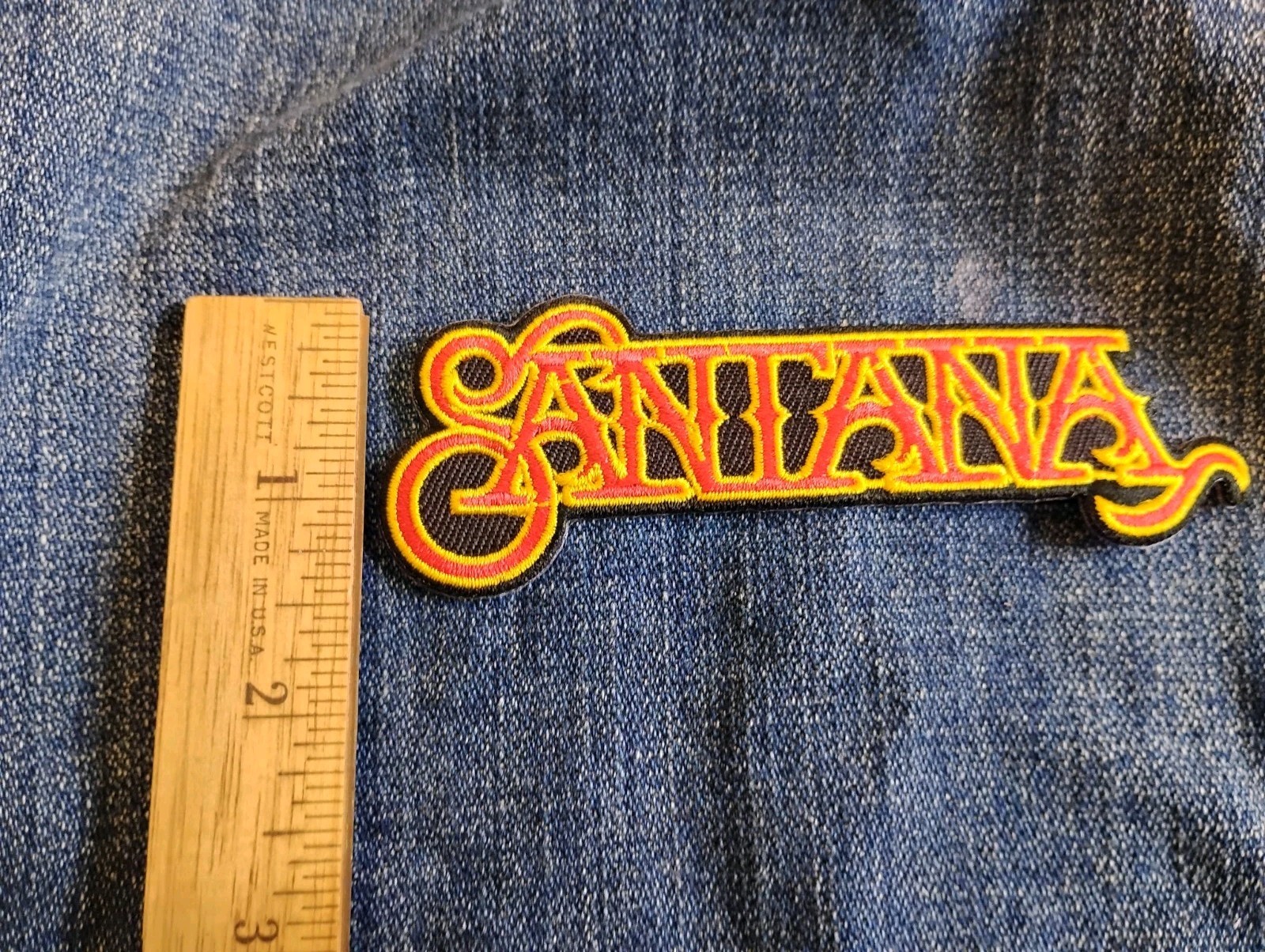 Santana Red, Black and Gold Logo 4.5 x 1.25 Inch Iron On Patch