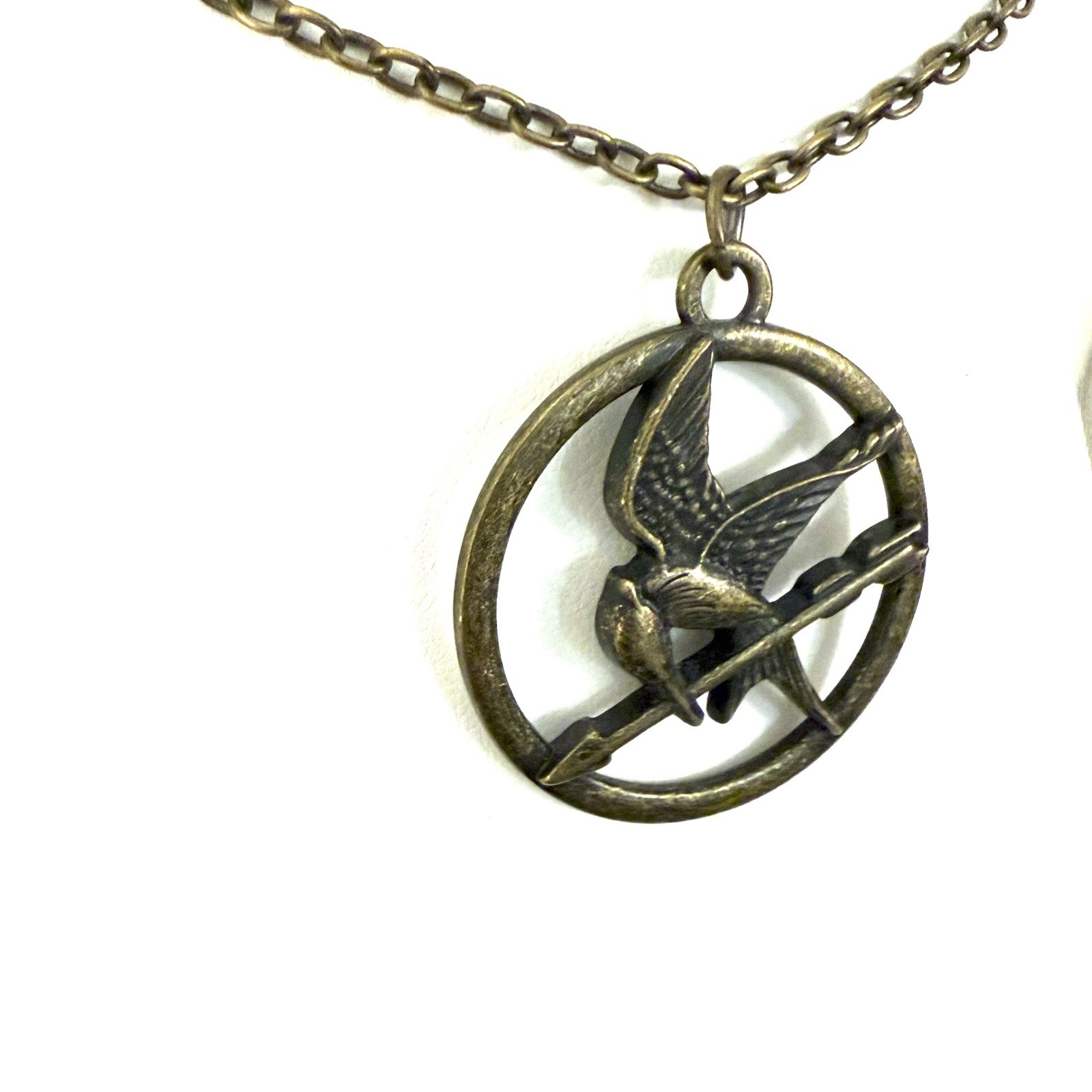 Hunger Games Mockingjay Necklace • Lionsgate Bronze Bird Arrow Pendant