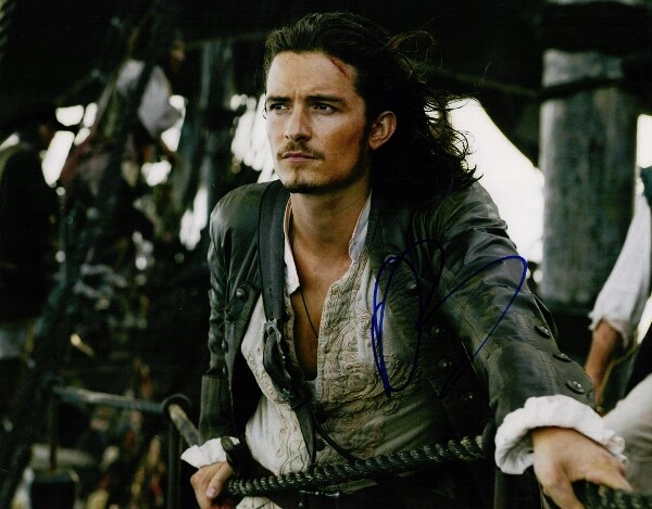 Orlando Bloom Signed – Autographed Pirates of the Caribbean 11×14 inch Photo COA