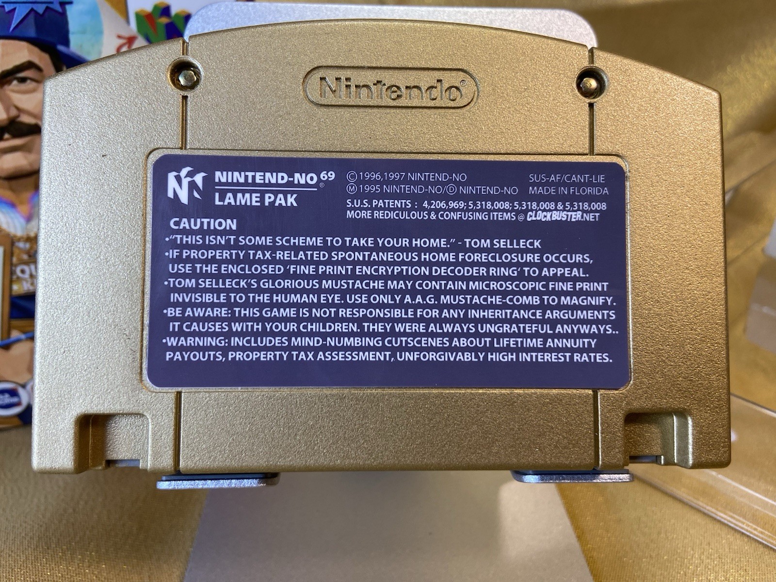 Tom Selleck Reverse Mortgage GOLD w/ contract Nintendo 64 style collectible