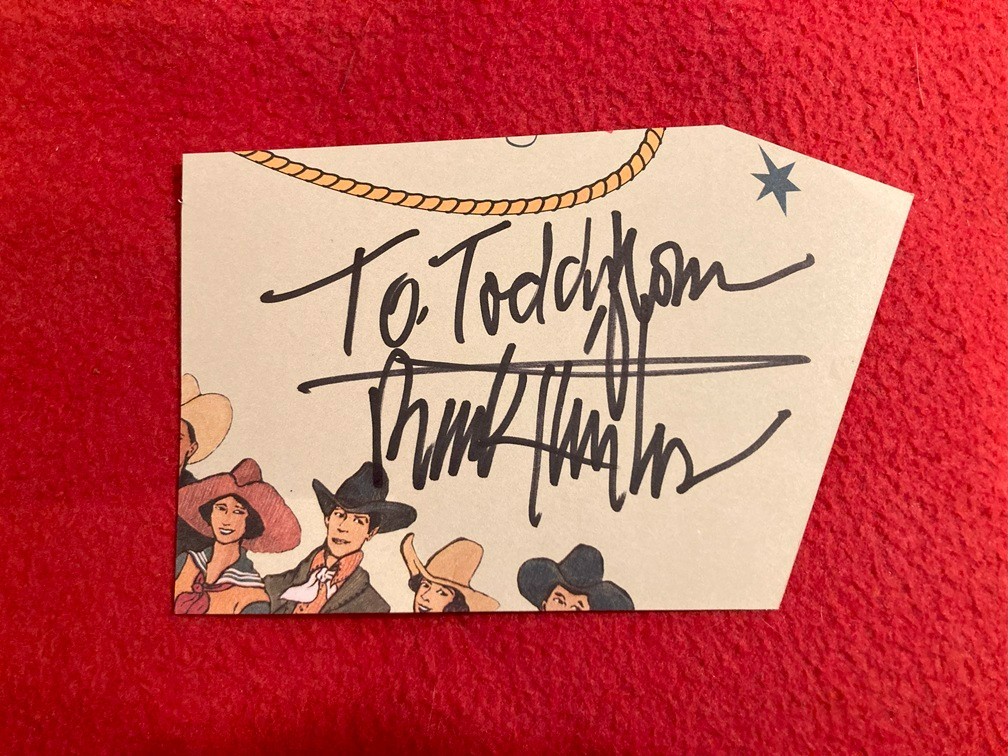 Authentic autograph actor/artist BUCK TAYLOR cut of signed western event program