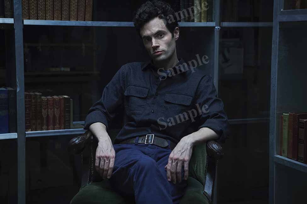 Photo Poster Penn Badgley Joe Goldberg on chair in book storage cage You CL3784