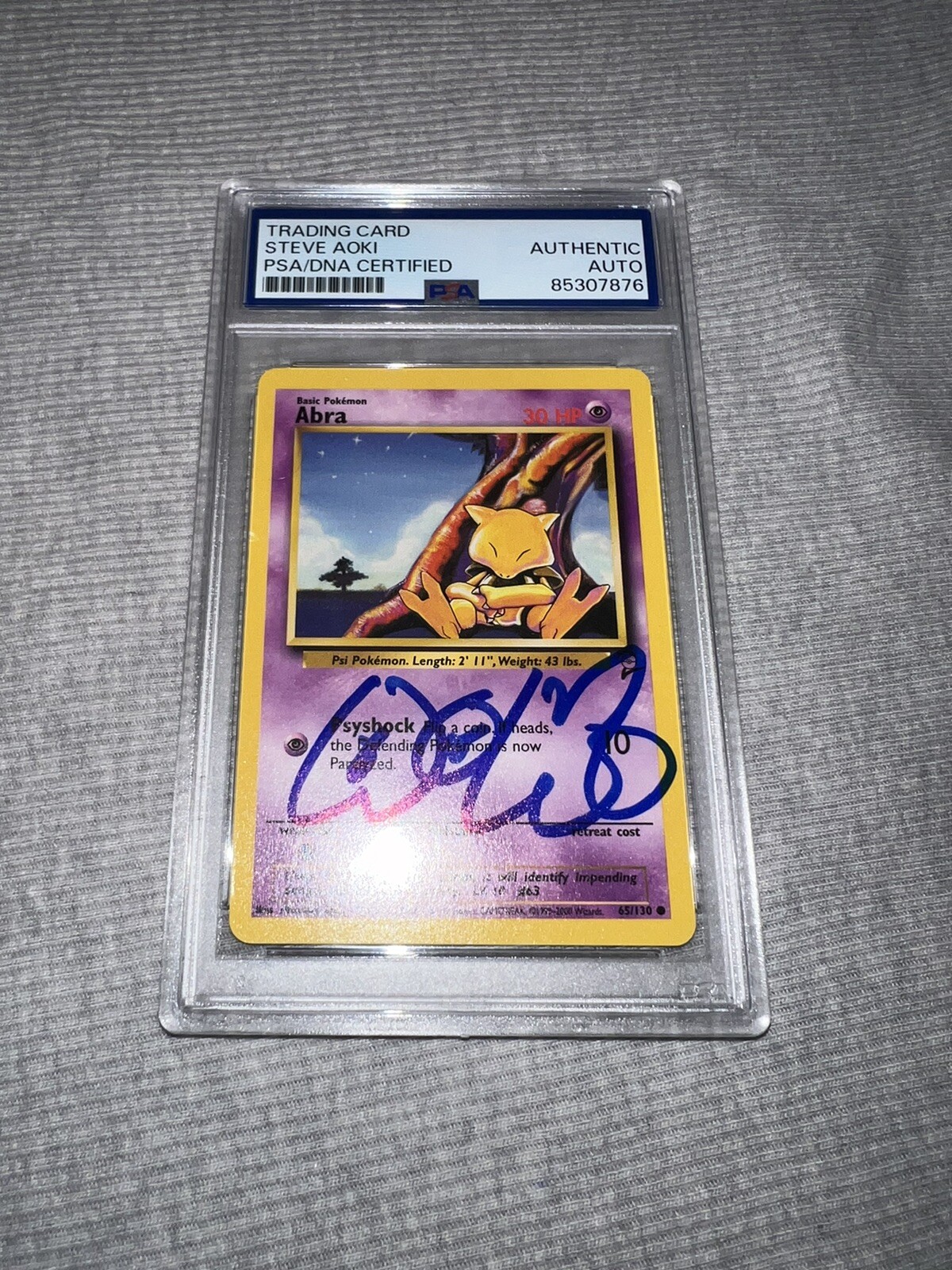 Steve Aoki Signed Official Pokemon Trading Card Base Set 2 Abra PSA/DNA