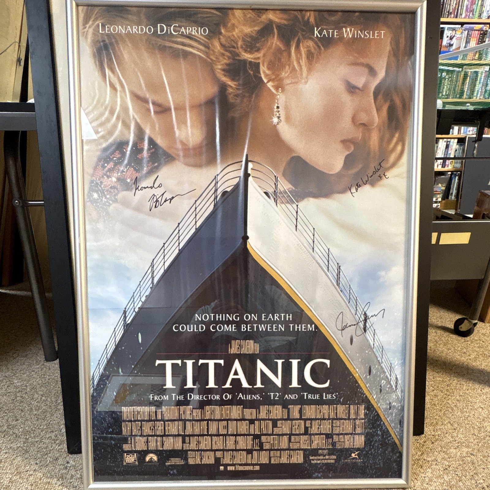 Titanic Poster Signed By Leonardo DiCaprio, Kate Winslet, & James Cameron FRAMED