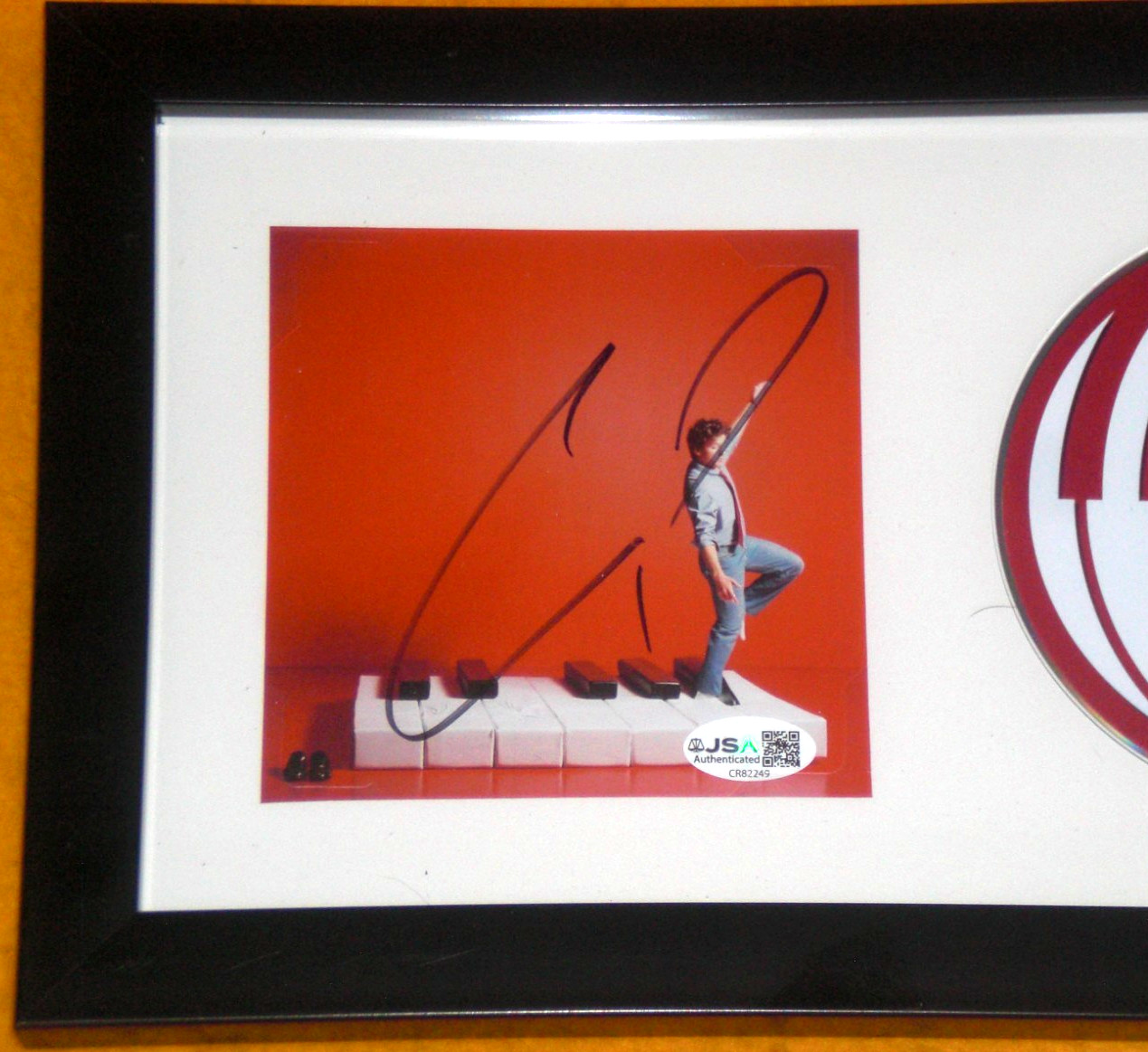 CHARLIE PUTH SIGNED FRAMED ‘WHATEVER’S CLEVER’ CD INSERT w/ CD – J.S.A. Cert