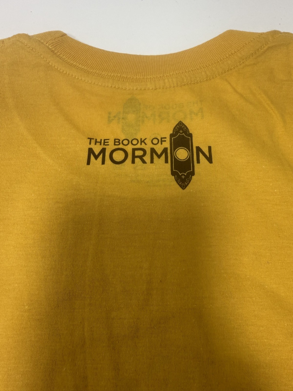 THE BOOK OF MORMON BROADWAY MUSICAL + GODS FAVORITE TEE T-SHIRT + ORIGINAL! NEW!