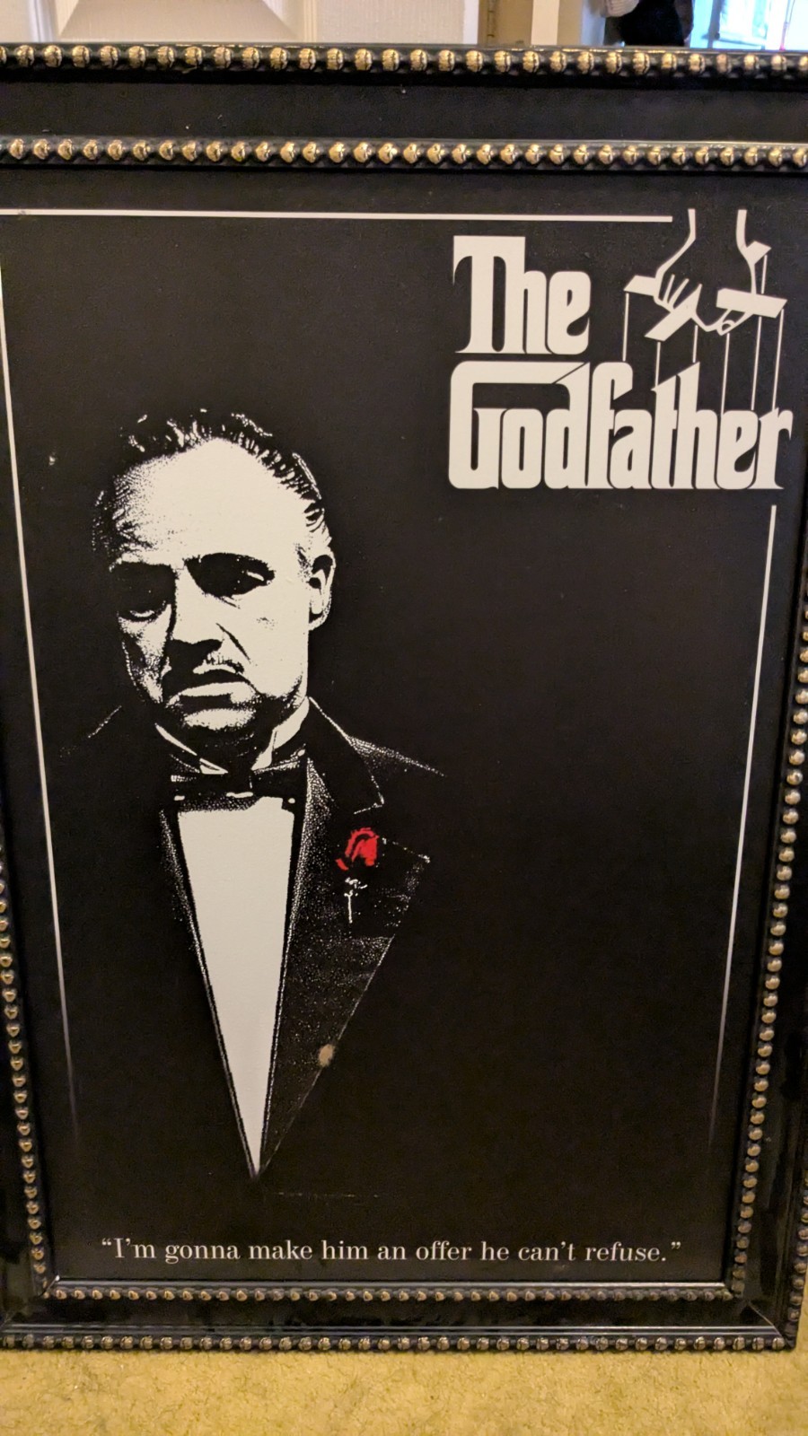 The Godfather in a black and gold 29×42 wood frame on a matted canvas.