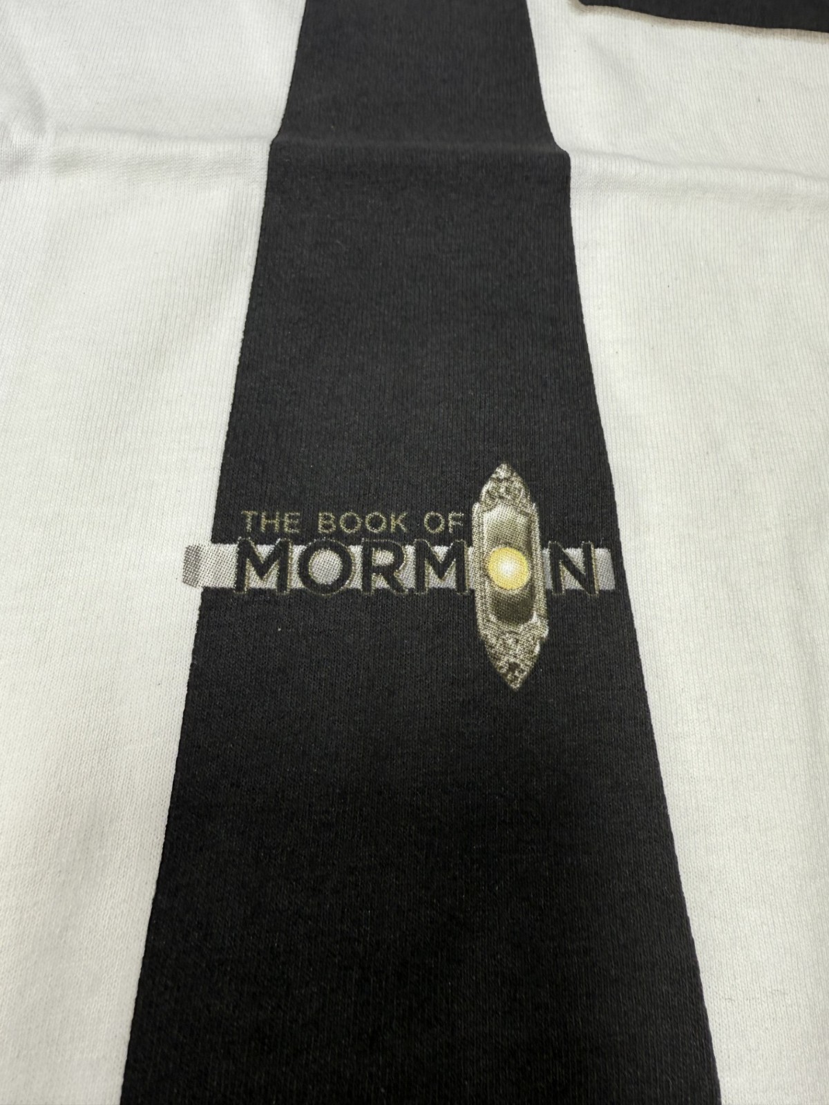 THE BOOK OF MORMON BROADWAY MUSICAL + TIE TEE T-SHIRT + ORIGINAL! NEW MERCHANDIS