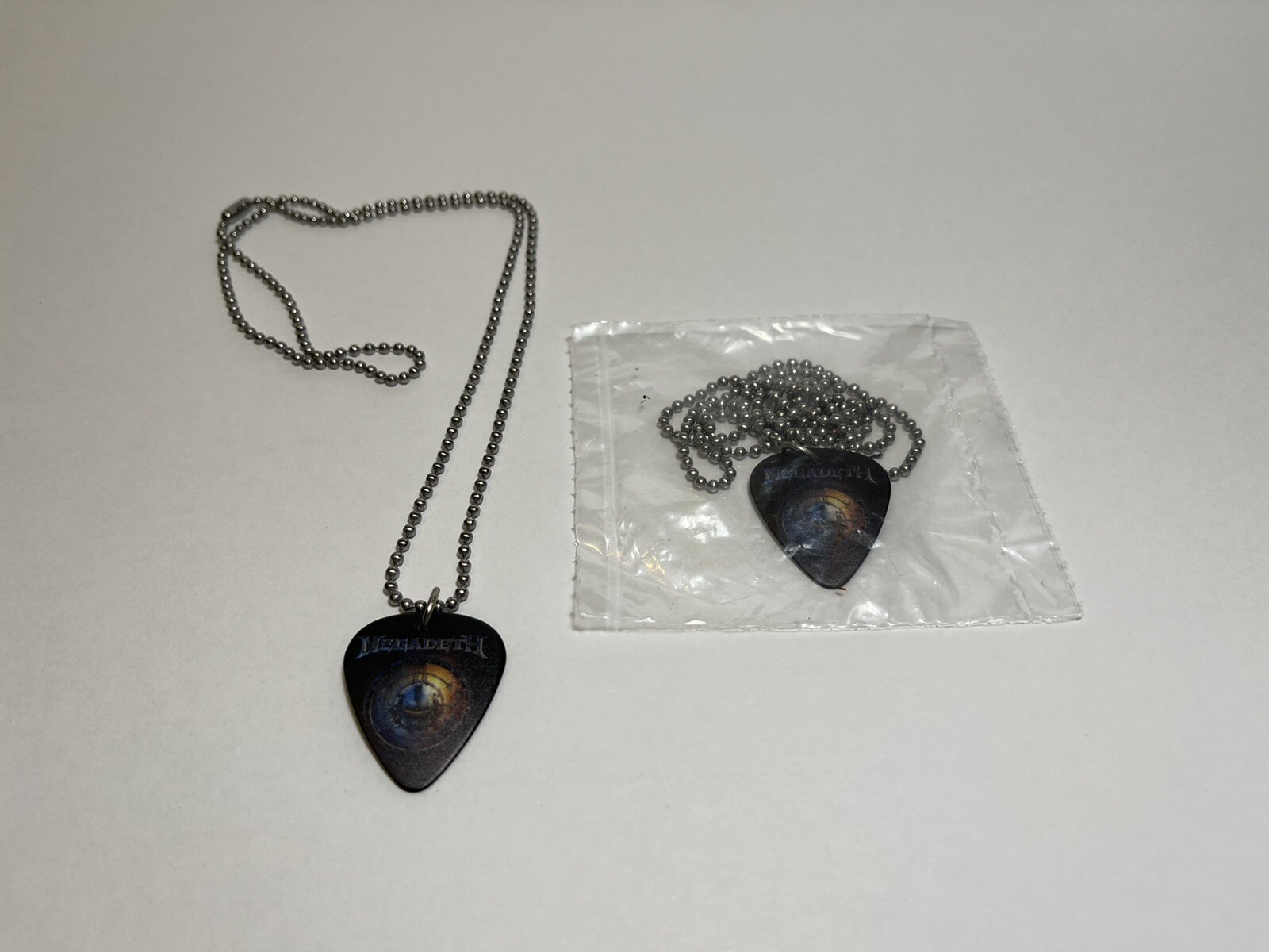 2 Megadeth Vic Rattlehead Guitar Pick Pendant Chain Necklaces NEW – 2 For $9.99