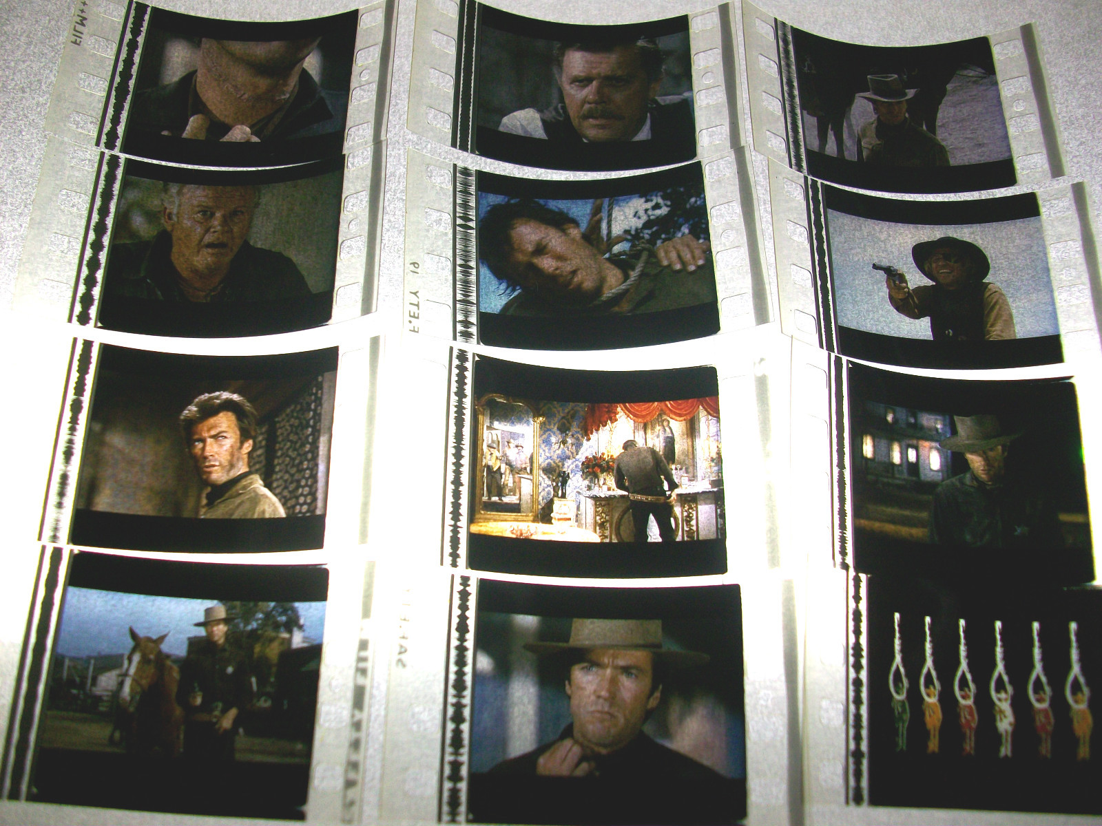 HANG EM HIGH Film Cell Lot of 12 – collectibles compliments movie dvd poster