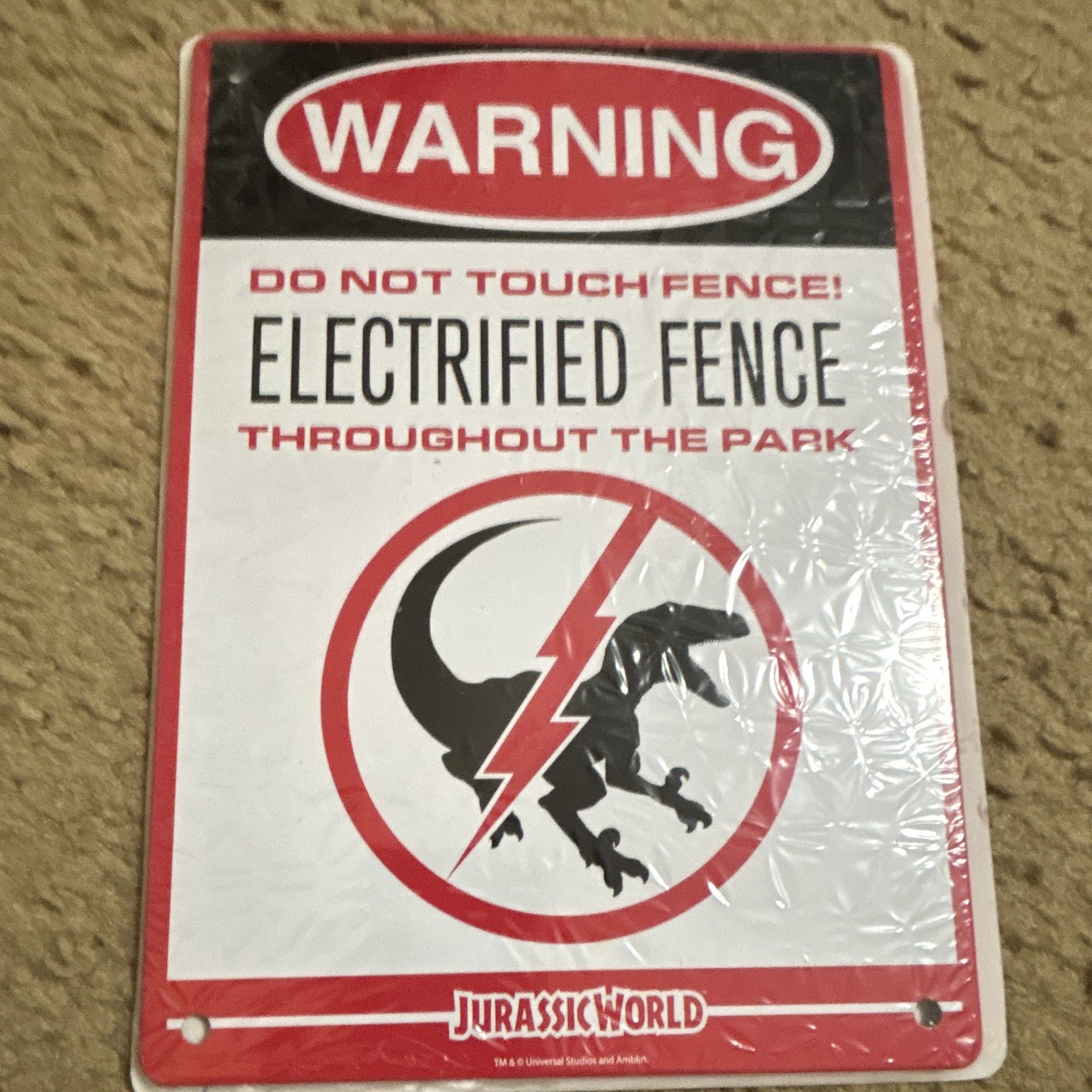 Jurassic World Warning Electrified Fence Throughout the Park Metal Sign