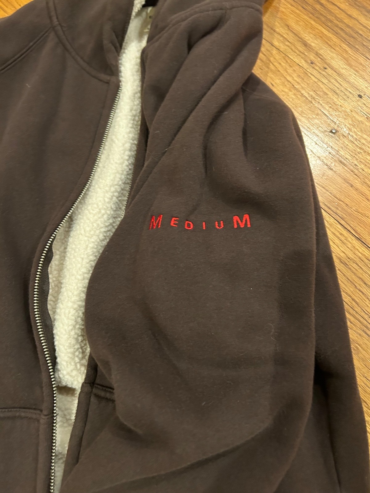 Cast & Crew hoodie from Medium TV Series Brown zip