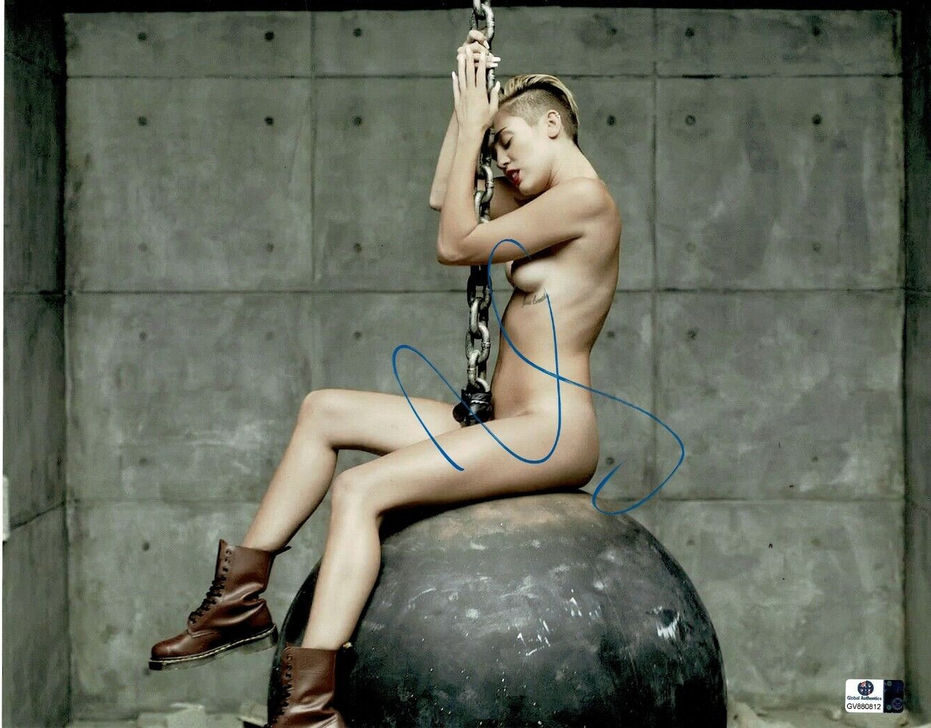 MILEY CYRUS SIGNED 11X14 PHOTO “WRECKING BALL” GLOBAL AUTHENTICS COA