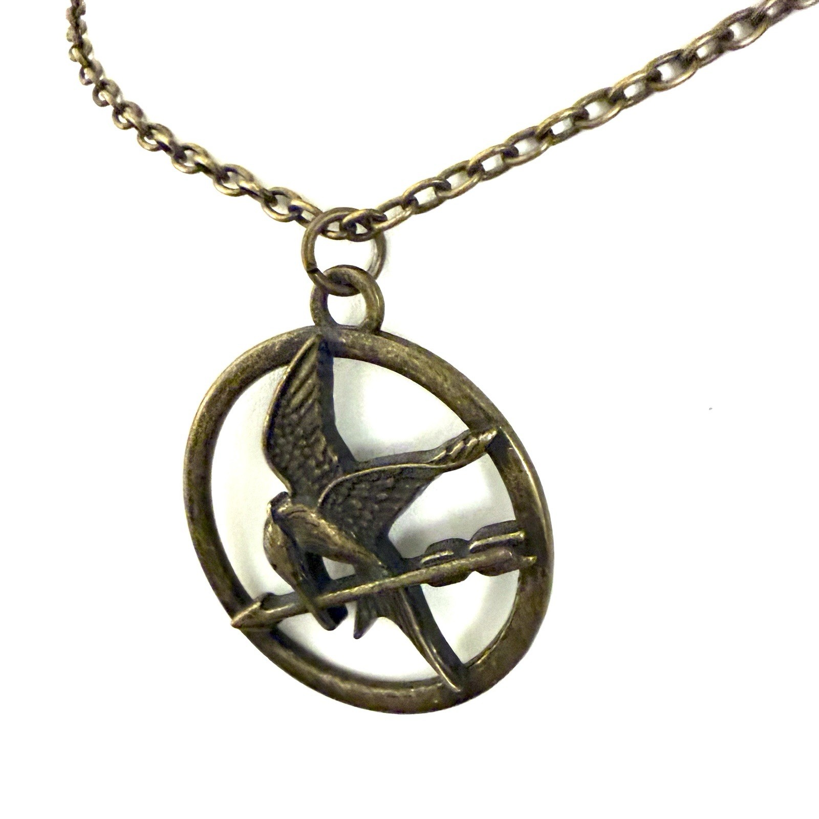 Hunger Games Mockingjay Necklace • Lionsgate Bronze Bird Arrow Pendant