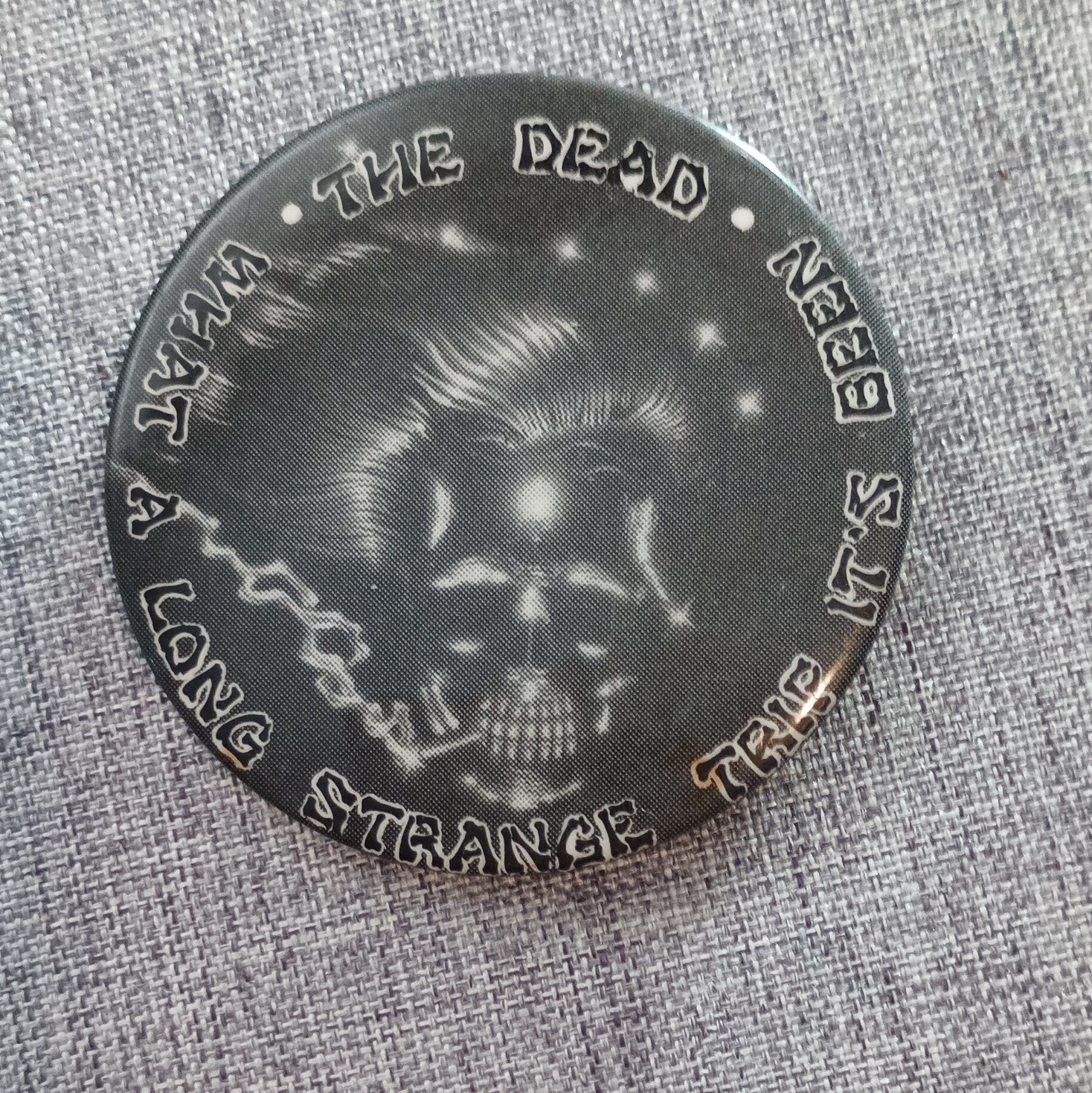Grateful Dead, Vintage “What a Long Strange Trip it’s Been” Skull Pinback Button