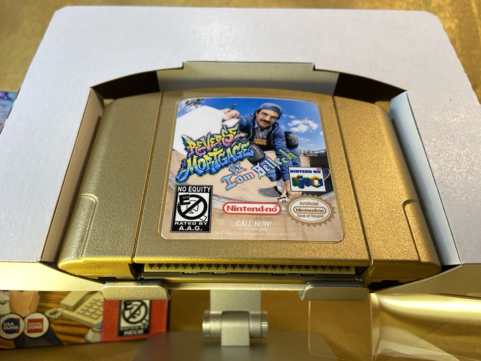 Tom Selleck Reverse Mortgage GOLD w/ contract Nintendo 64 style collectible