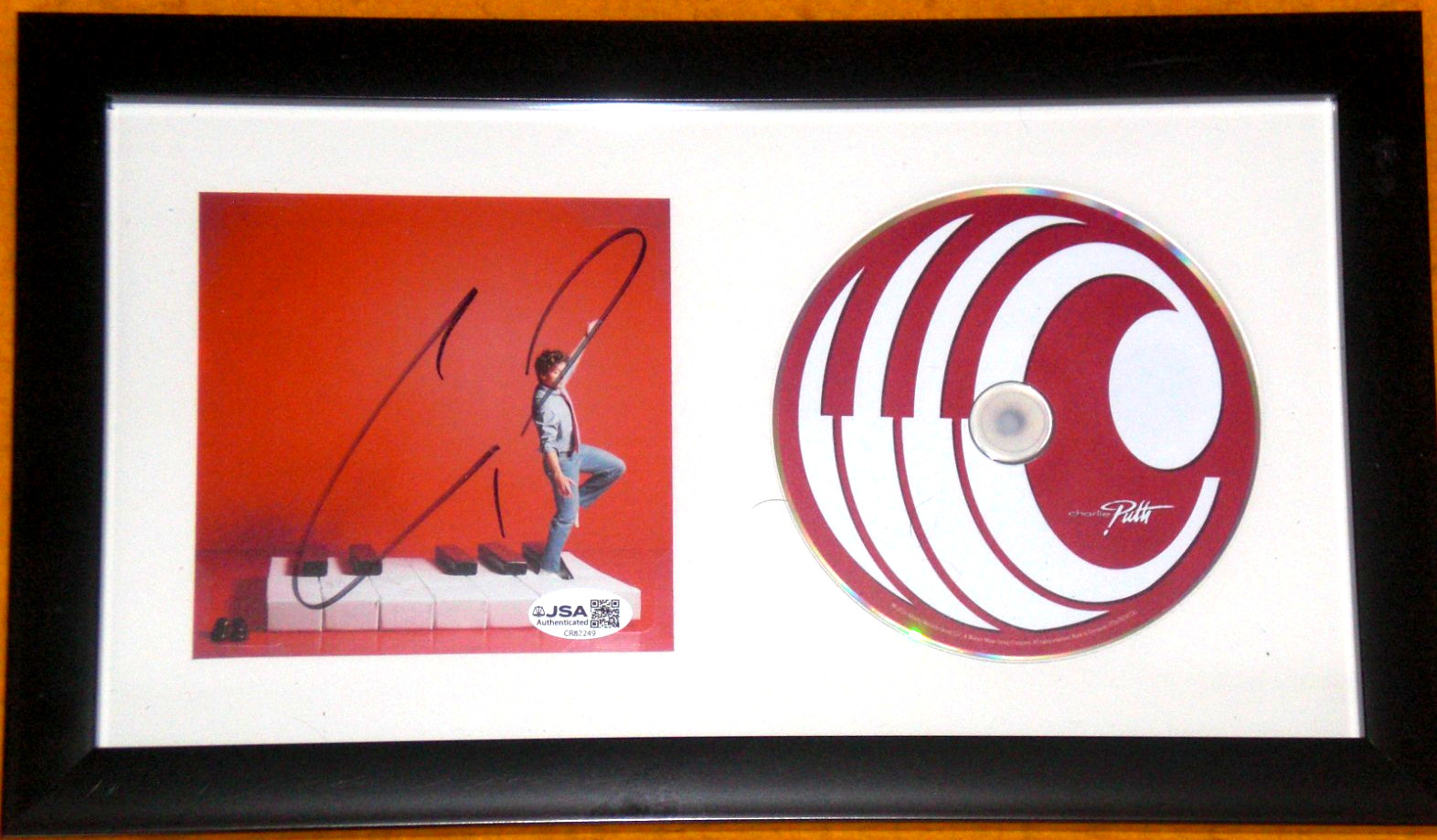CHARLIE PUTH SIGNED FRAMED ‘WHATEVER’S CLEVER’ CD INSERT w/ CD – J.S.A. Cert