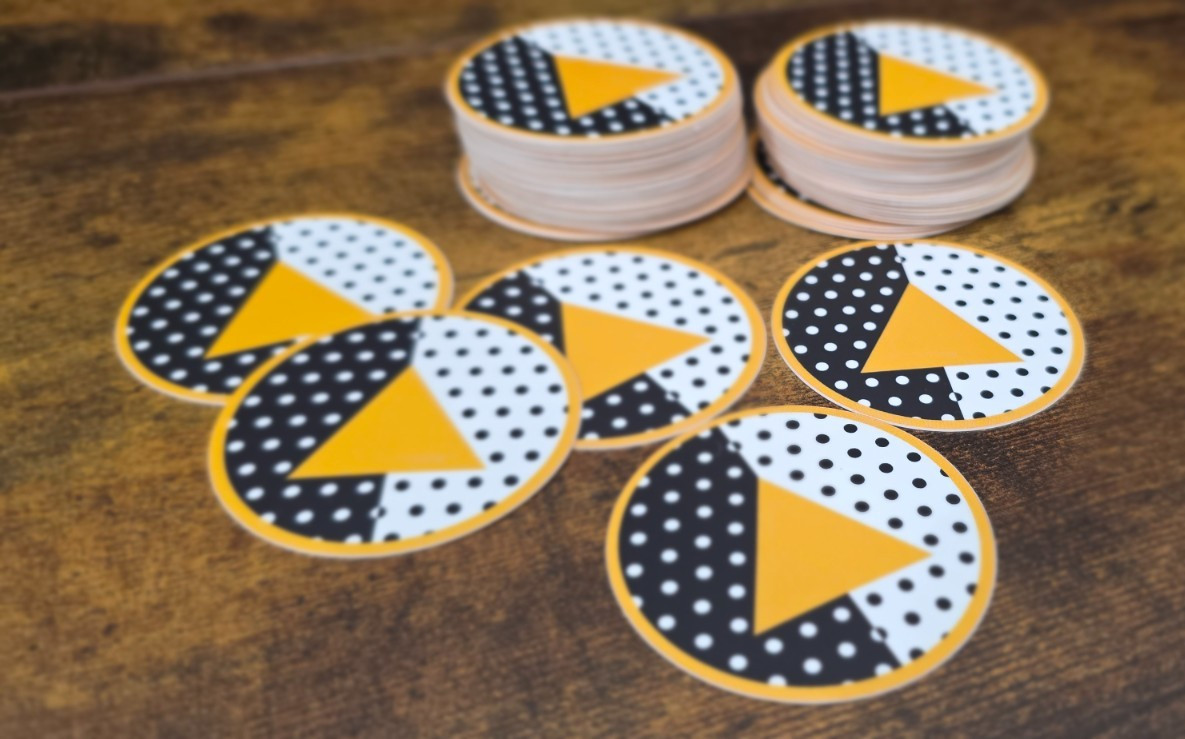 Angine de Poitrine Sticker – White and Black Polka Dot with a Yellow Trianlge