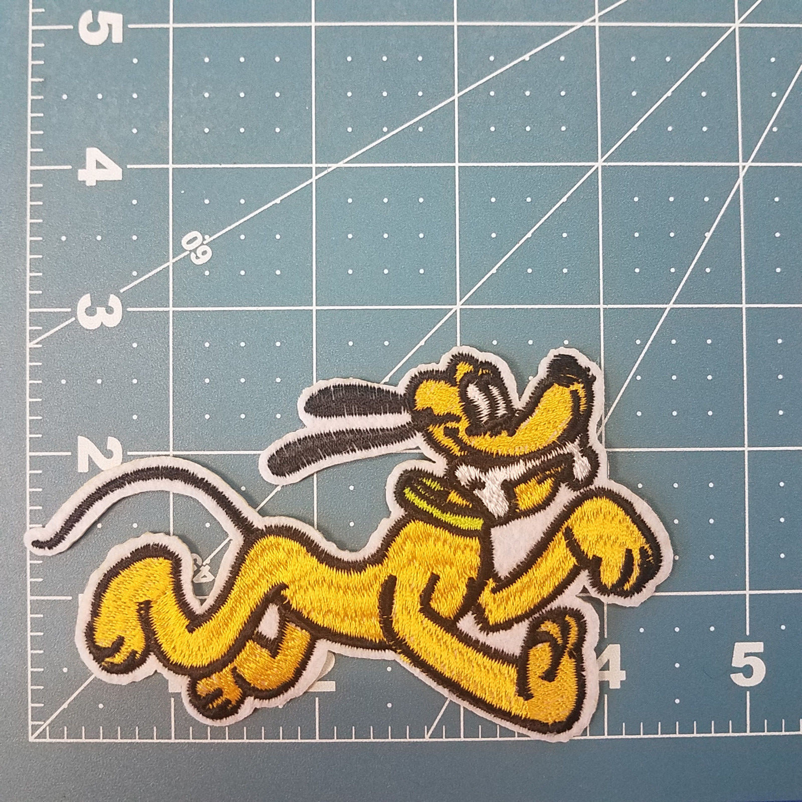 Pluto Dog with Bone Patch 4 1/2 inches wide