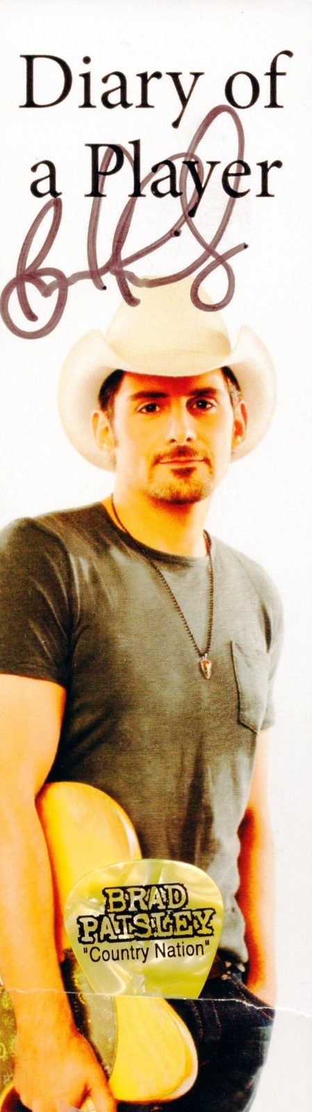 BRAD PAISLEY SIGNED “DIARY OF A PLAYER” BOOKMARK GUITAR PICK, W/COA