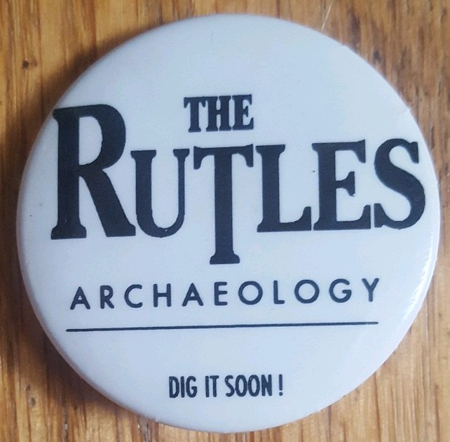 The Rutles Pin Archaeology Dig It Soon Pin Button Beatles