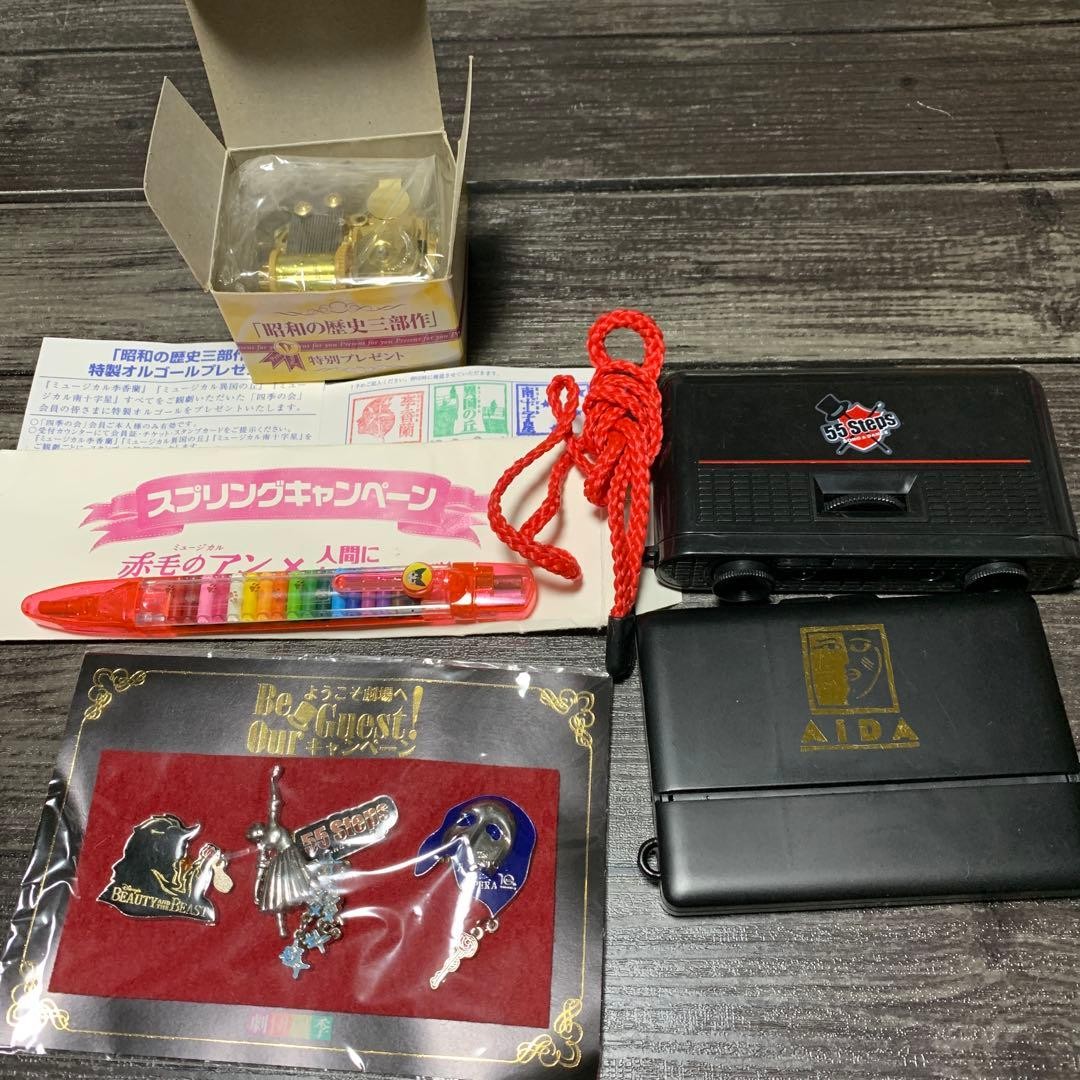 Shiki Theatre Company merchandise set: music box, pin badge, binoculars