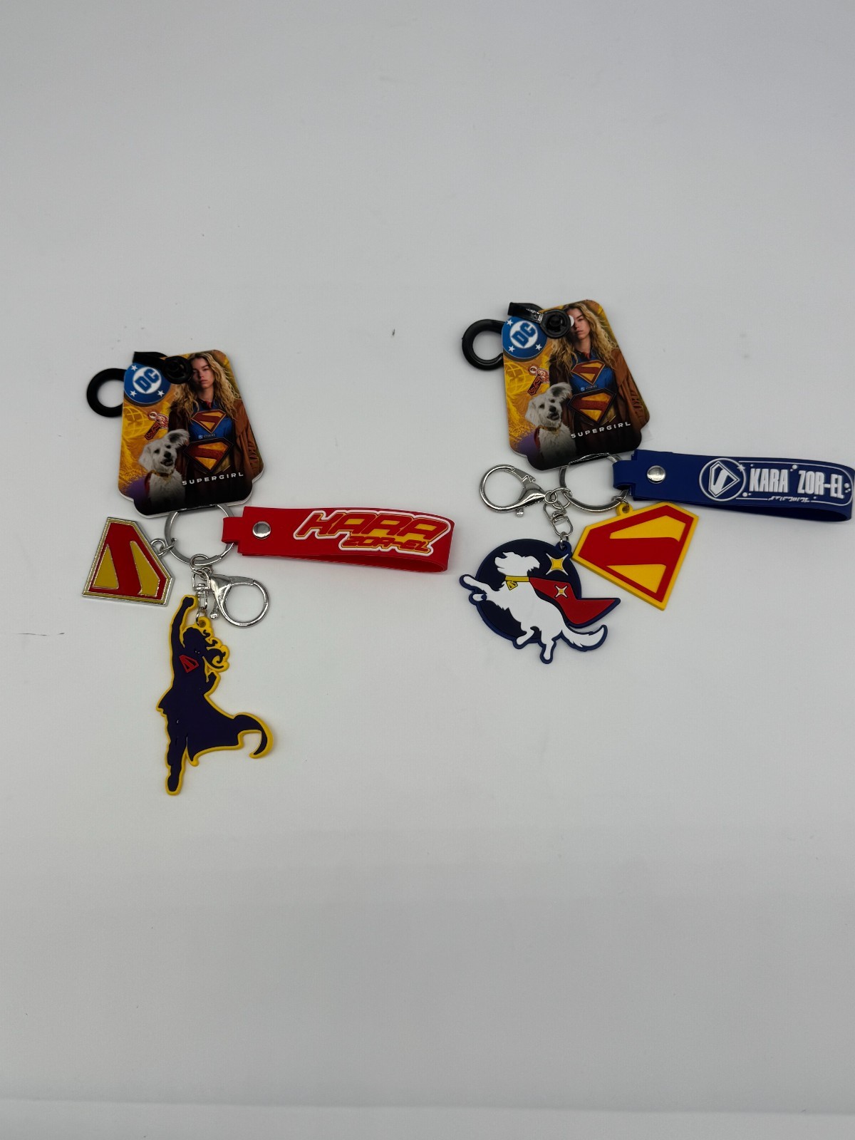 Supergirl Movie Keychains – Krypto and Supergirl – Red and Blue