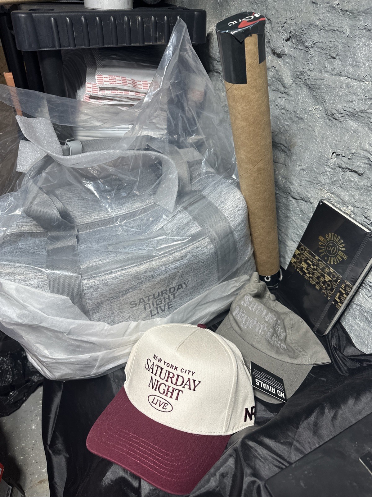 SNL 50 Lot – Dagne Dover Duffle Bag, 2x Hat, Moleskin Notebook, Pop Chart Poster