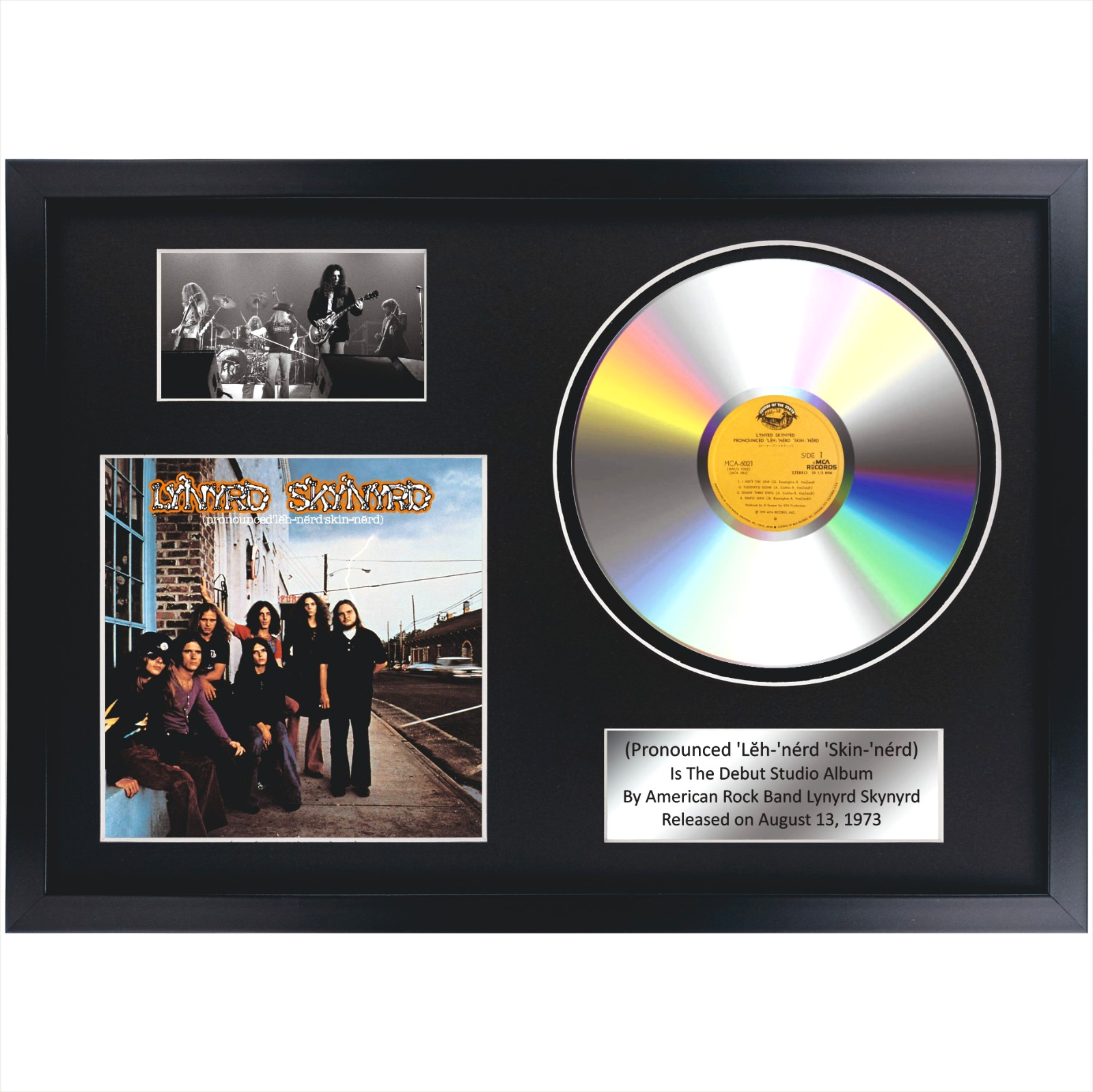 Lynyrd Skynyrd – (Pronounced ‘Lĕh-‘nérd ‘Skin-‘nérd) / Souvenir in black frame