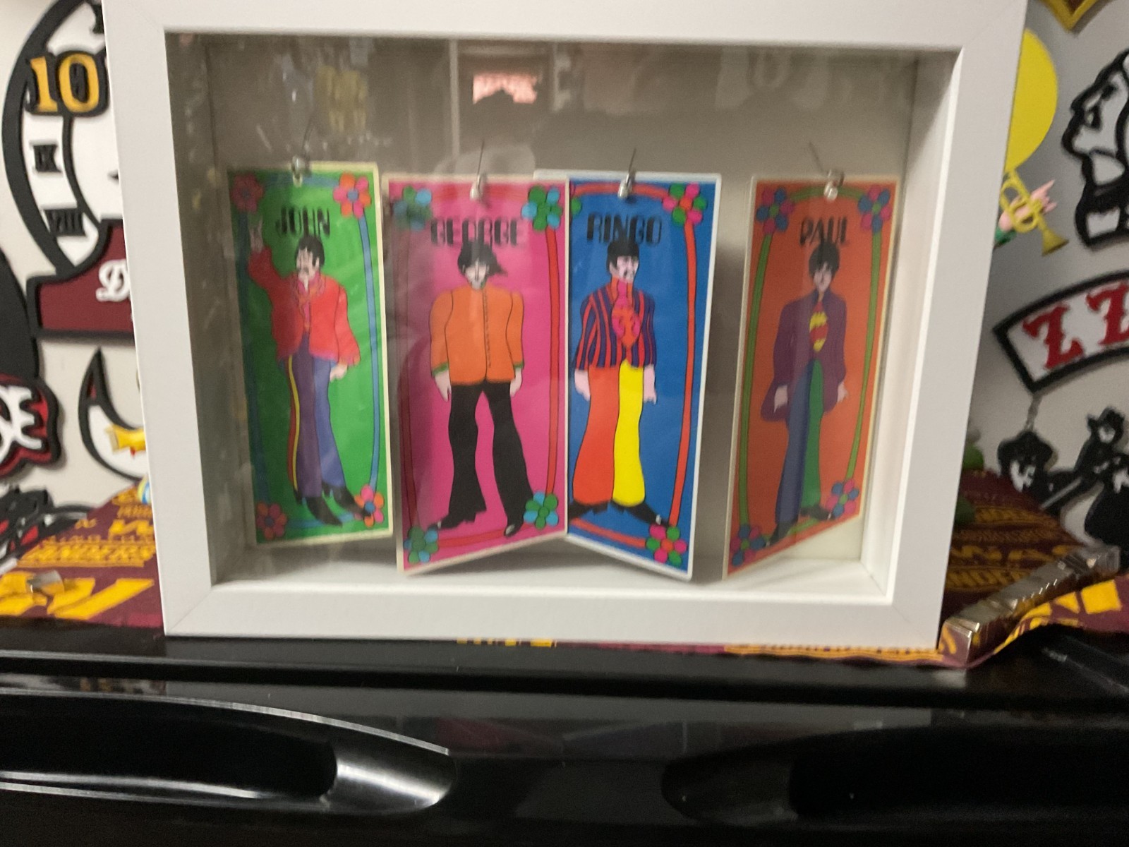 BEATLES RARE KEYCHAINS, LOT OF 4 IN A SHADOW BOX