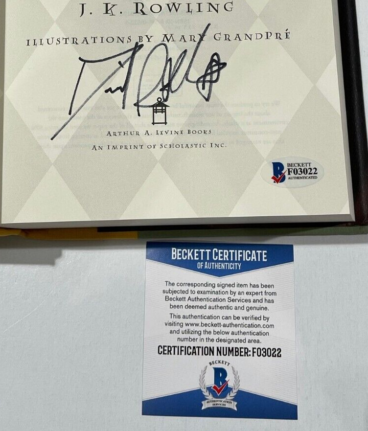 DANIEL RADCLIFFE SIGNED HARRY POTTER AND THE DEATHLY HALLOWS BOOK BECKETT 4