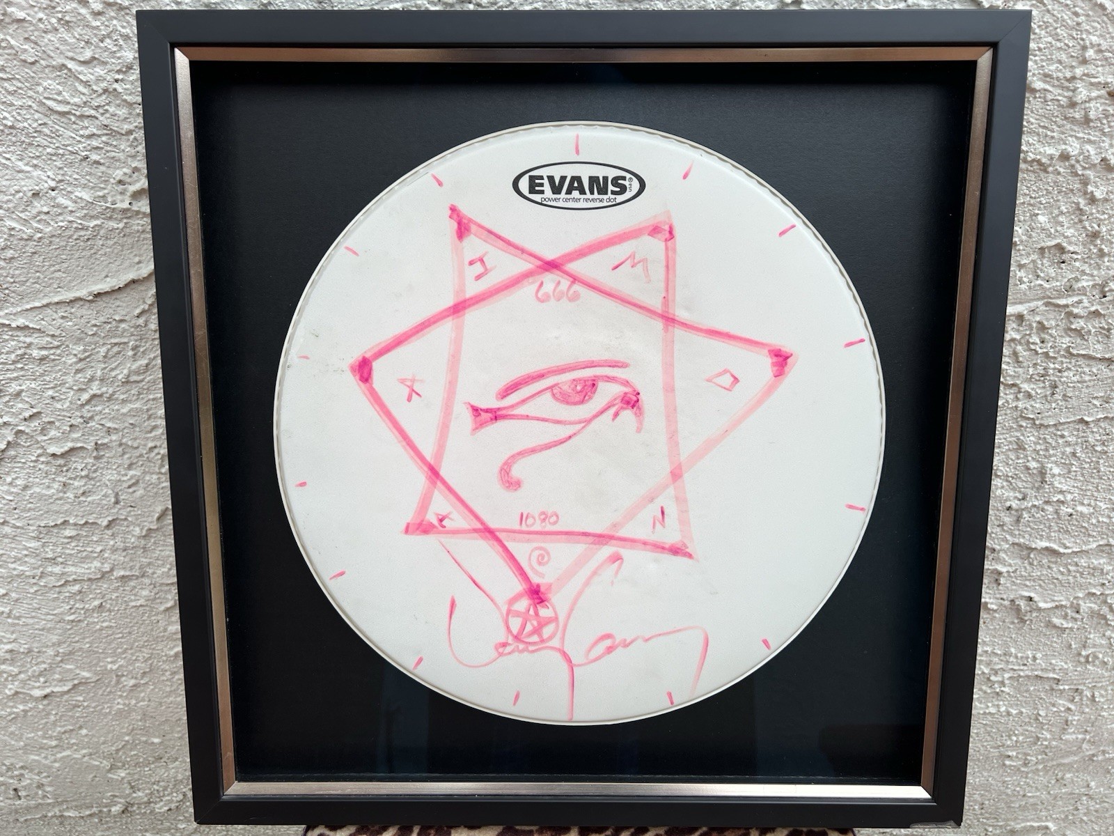 Danny Carey signed drumhead (14″ – Purple marker sketch)