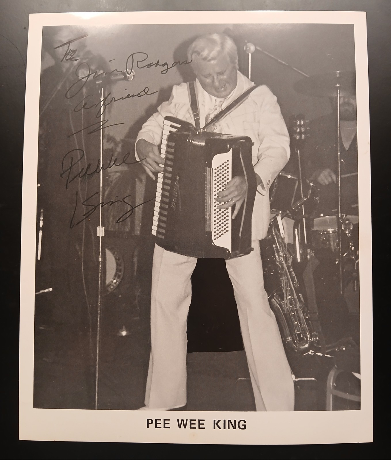 PEE WEE KING Autographed 8×10 photo with biography on back.