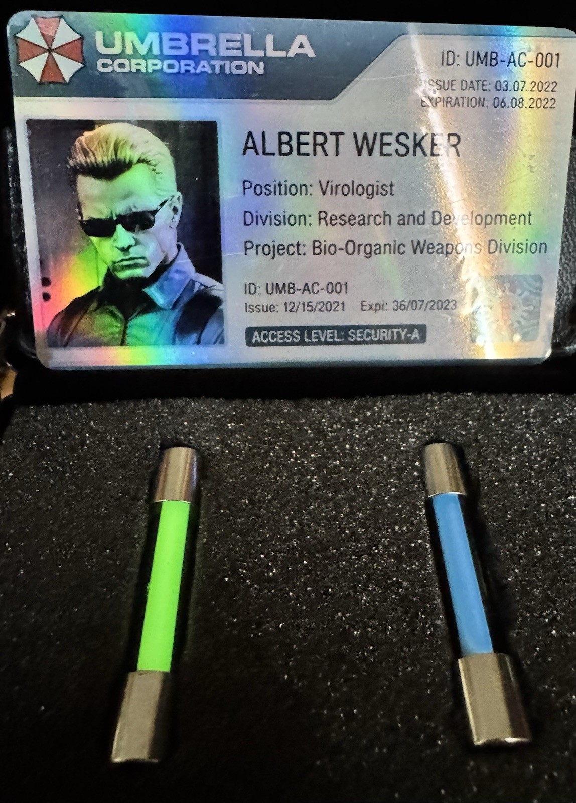T-Virus Glowing Umbrella Corporation Pendant Set + Storage Case + Wesker ID Card