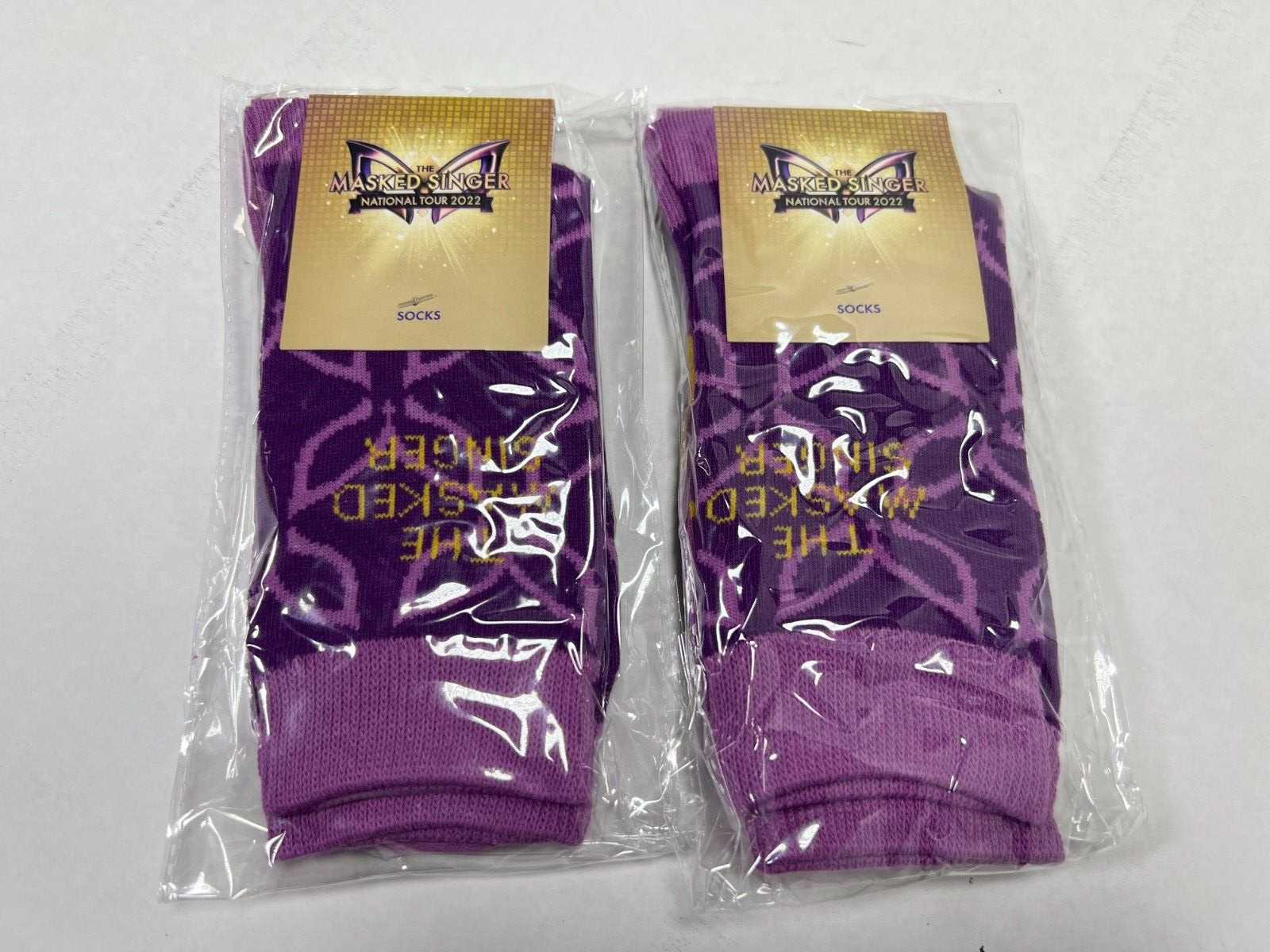 THE MASKED SINGER TOUR PURPLE SOCK 2 PAIR 2022 NEW OFFICIAL MERCHANDISE NEW!!!