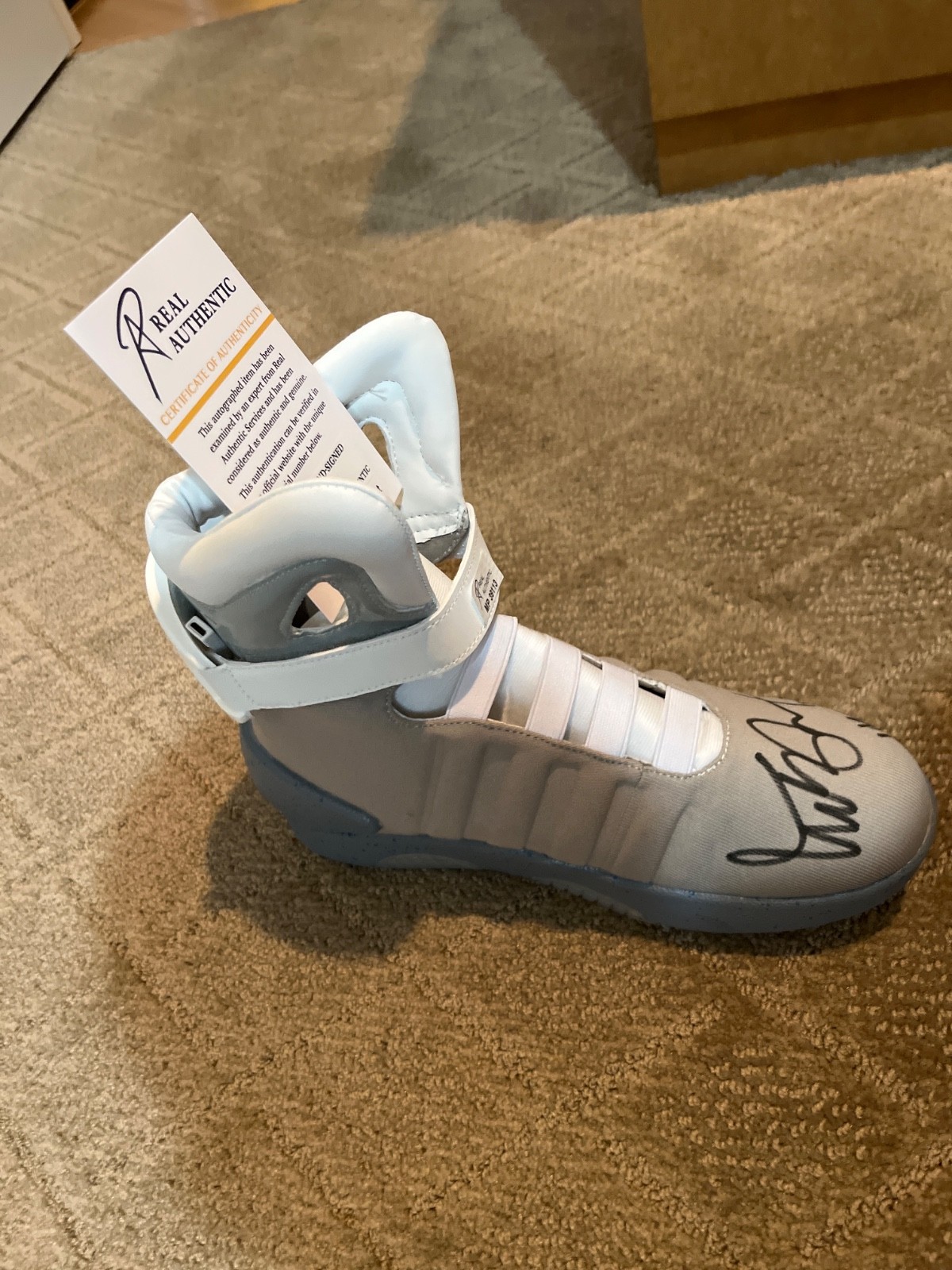 (REDUCED FOR BIDDING) MICHAEL J. FOX SIGNED BACK TO THE FUTURE SHOE (LEFT) COA