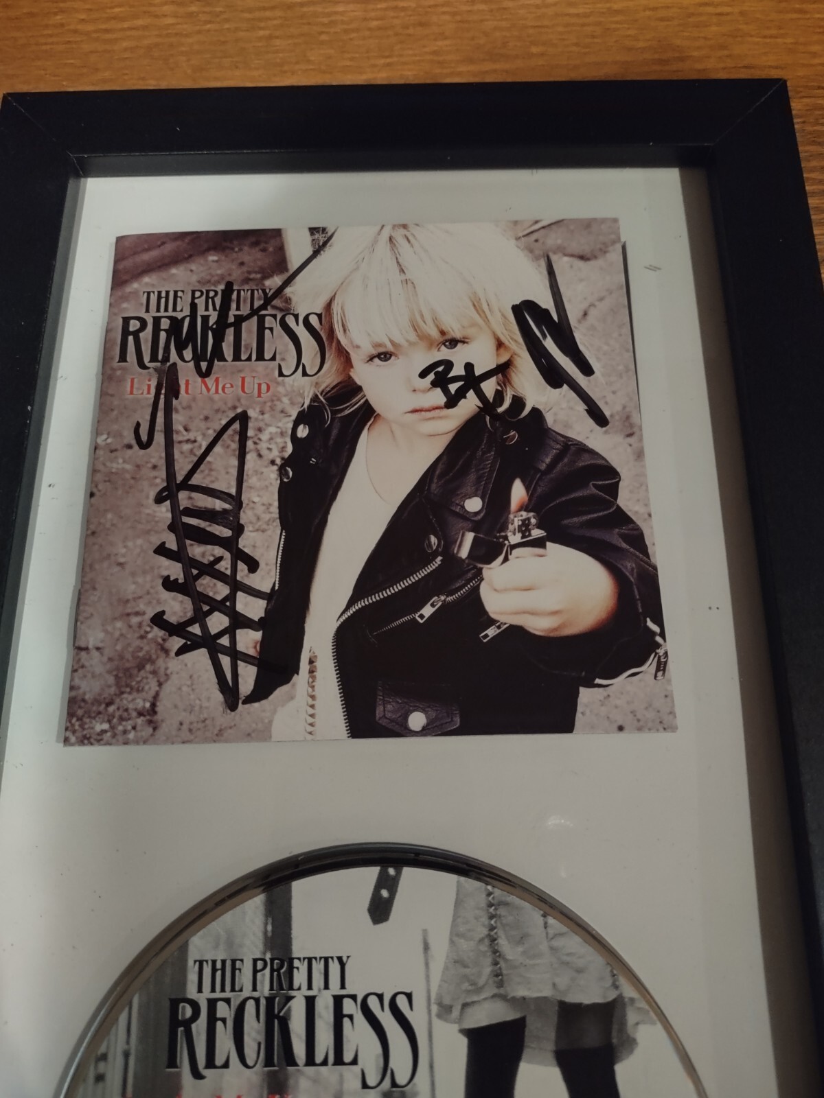 THE PRETTY RECKLESS SIGNED LIGHT ME UP CD FRAMED JSA Taylor Momsen +3 autograph