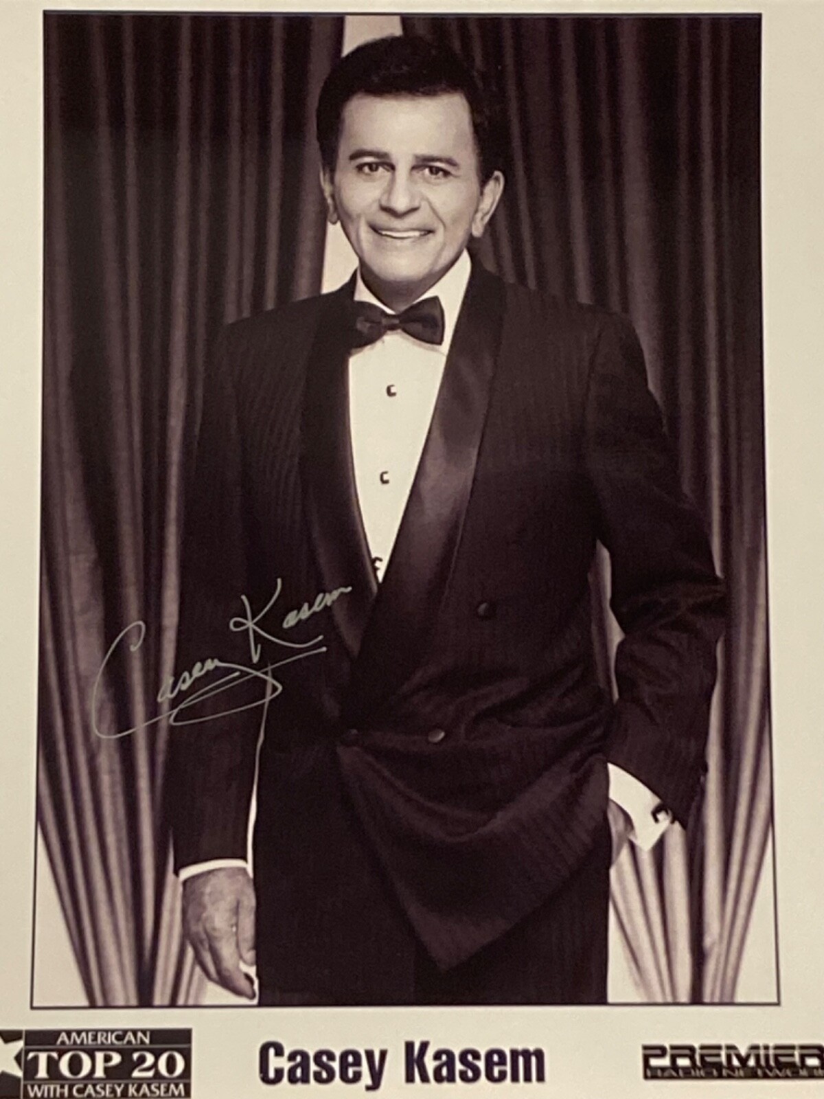 Hand SIGNED Casey Kasem 8×10 Vintage Photo – America’s Top 20 – Clear Silver Ink